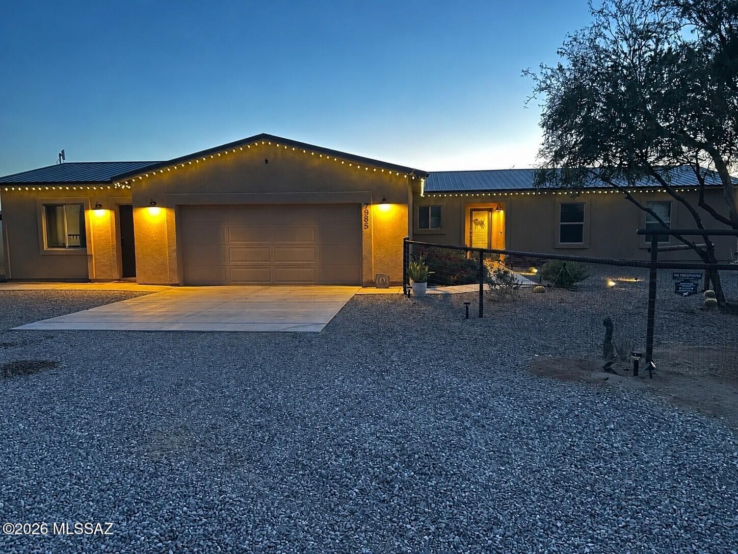 Newer 2021 custom home on 1 acres. Features 4 bedrooms and 2 bath in main home. Guest quarters feature 1 bed and 1 bath. Bunk room has studio and full bath. Main home has open floor plan with split bedrooms, kitchen with quartz counters, custom back splash, island and built in buffet for coffee station. Maintenance free scored concrete stained flooring thru out, metal roofing, wood fenced back yard, mare motel, and new one person bunk studio under construction will be completed prior coe. Rent out the bunk house or guest quarters for potential income. No HOA! Photo's coming soon.