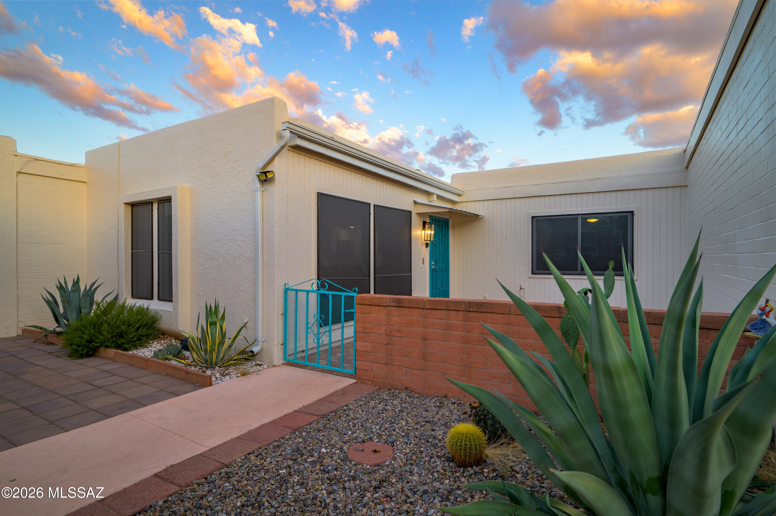 Some homes are just addresses. This one is a statement.
Every inch of this Green Valley Townhouses No. 7 gem has been thoughtfully updated. The completely remodeled kitchen features engineered stone countertops, new cabinetry, stainless steel appliances -- refrigerator and range included. New water heater. Stackable washer/dryer stays. Popcorn ceilings? Gone. New fans throughout. Wood laminate and tile floors run clean from room to room. Step outside to a private backyard retreat with serene views and sunshades that make the patio a year-round destination. Two-car carport. GVR access. Two bedrooms, two baths -- move-in ready and nothing left to do but enjoy it.
This is Green Valley living, upgraded.