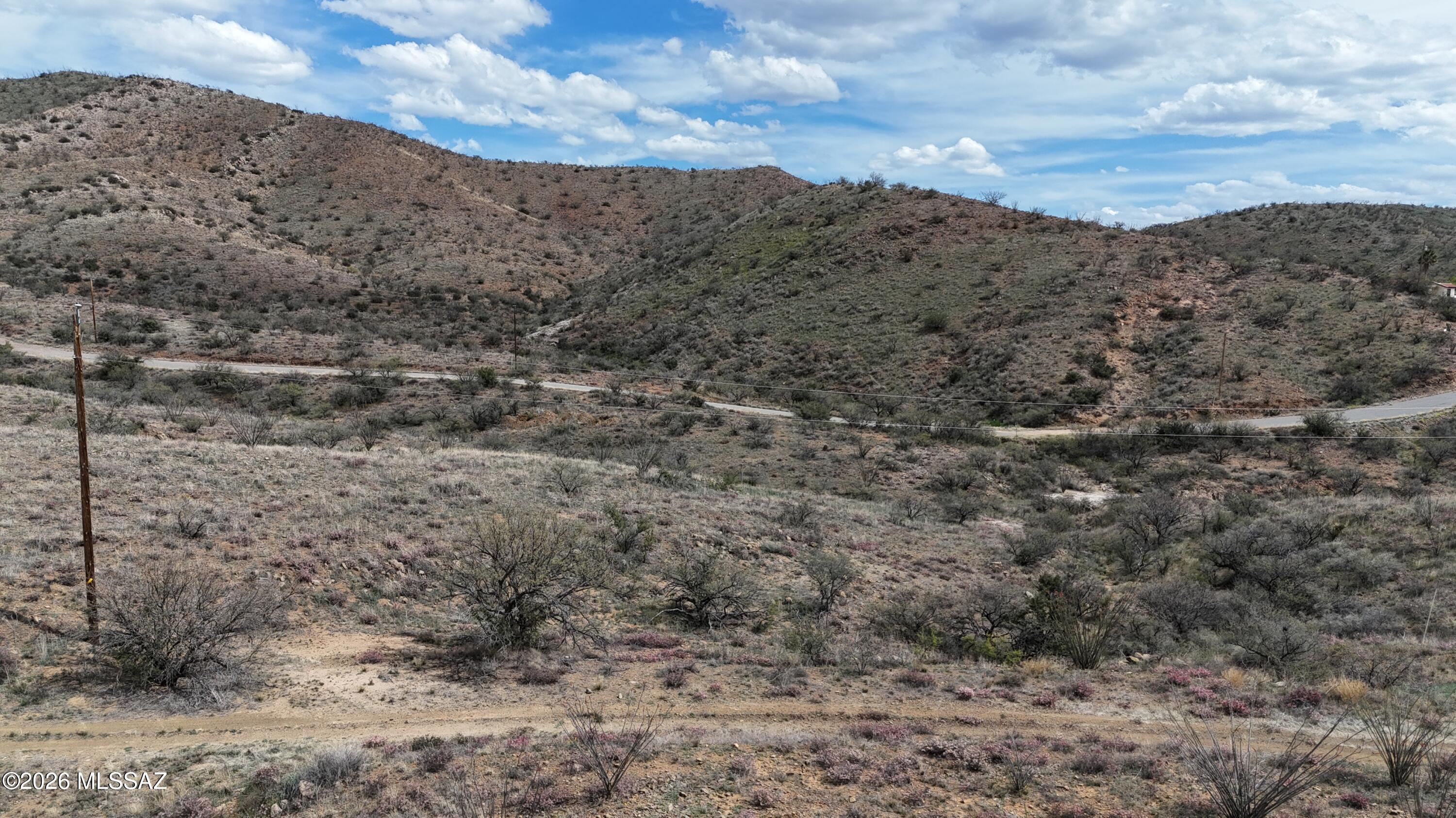 Residential lot tucked away in a valley just East of Rio Rico Drive.