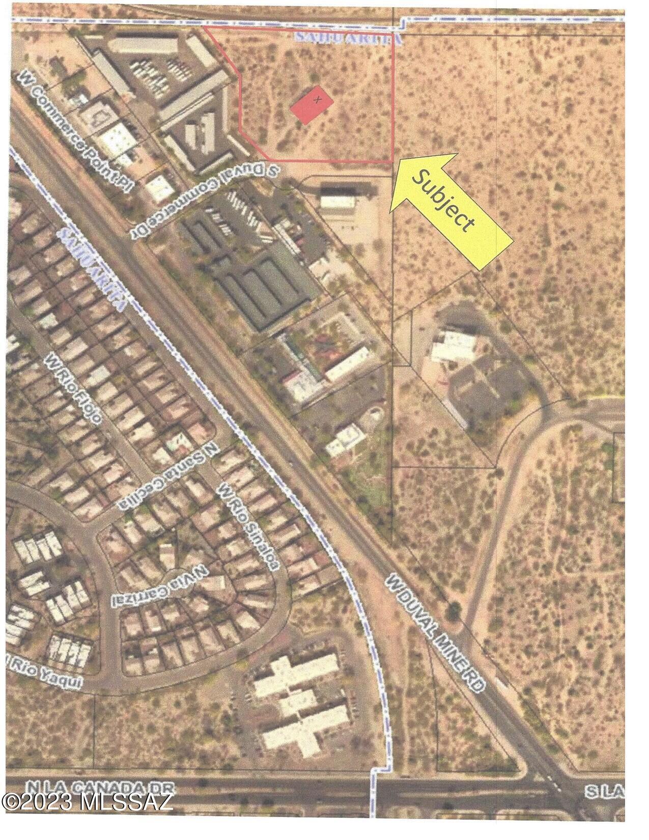 This industrially zoned property is at the end of Duval Commerce Park Road. The CI-1 zoning permits many options. This is one of the last lots left of this size with this zoning in all of the Sahuarita/Green Valley area. It's in a platted subdivision with county maintained paved roads. Owner cans split the property one time with permission from the Town of Sahuarita.