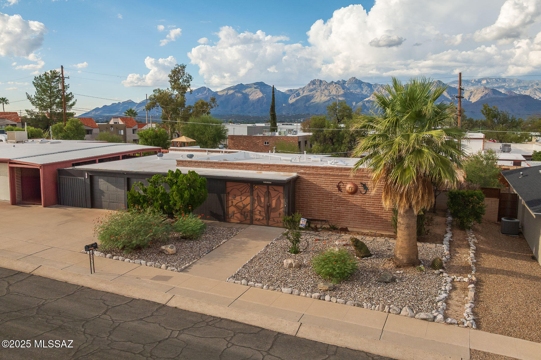 Charming 4-Bedroom Home with many upgrades on a Spacious Lot with Incredible Mountain views! 

This home is packed with features inside and out.

Interior Highlights:

Fresh Interior Paint in Dunn-Edwards ''Navajo White''

Upgraded Tile and Carpet throughout

Central Air Conditioning & Natural Gas Forced-Air Heating

Beautiful Maple Cabinetry & Quartz Countertops in kitchen

Very nicely redone bathrooms with tile surrounds, upgraded vanities and tops.

Washer and Dryer included

Exterior Features:

Slump Block Adobe Construction, sealed with waterproof coating

Dual Pane Vinyl Windows for energy efficiency

Security Features:

Wrought iron front entry with security doors. Security rolling shutters on 2 rear doors and 2 east-facing bedroom windows.