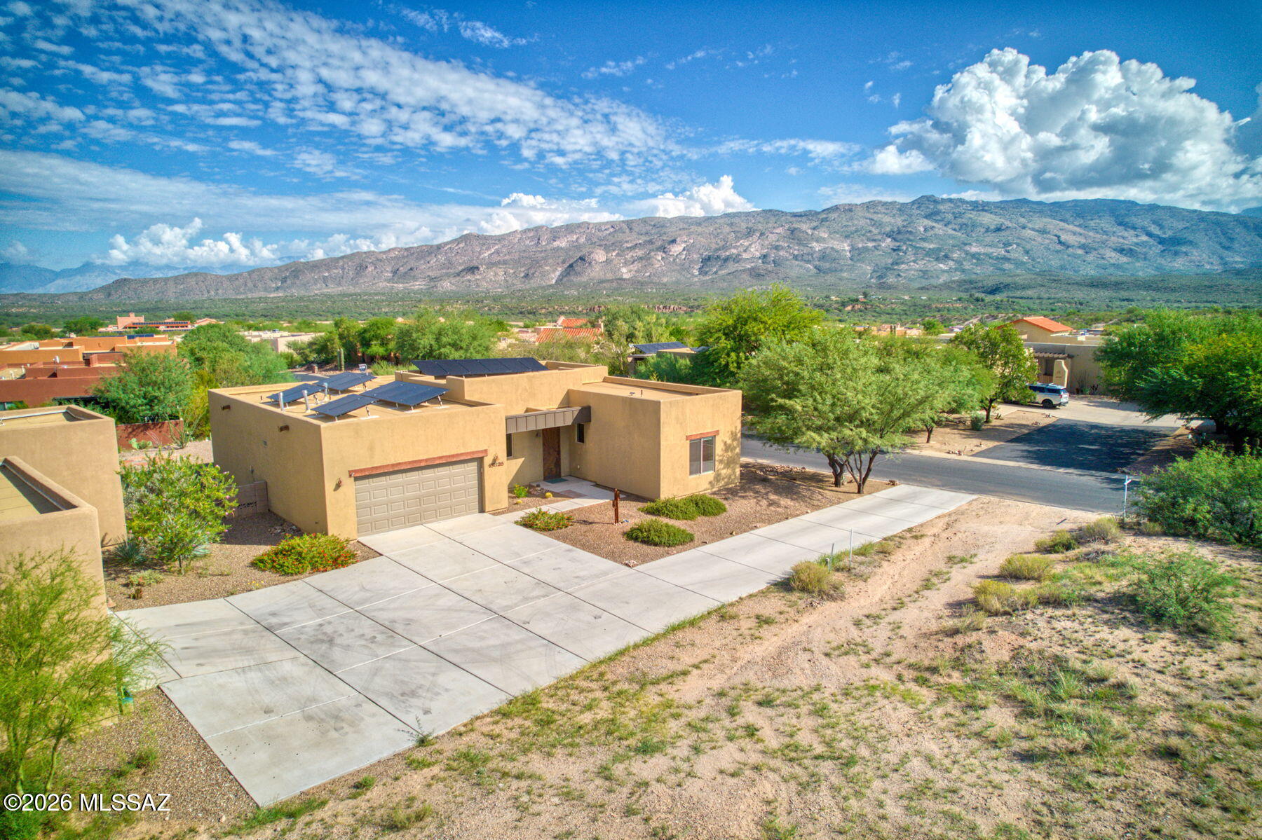 Adventurous. Fun, Active & Relaxing. Sounds Like You're Ready! Welcome home to Academy Village. This bright 2BR/2BA + den offers an open floor plan, mountain views & Sonoran sunsets from your private back patio. Open space nearby adds extra privacy, plus owned solar for energy savings. Academy Village is Tucson's premier 55+ active adult community: resort-style amenities, fitness & wellness programs, hiking trails, classes, concerts, and a social calendar you can join as much (or as little) as you like. No pressure. High energy. Real community. Turn-key available; rentals allowed for a seamless move. Live well, laugh often; your next adventure starts here!   RATES ARE UP-WE'VE GOT YOU COVERED! Seller is offering a 1-year rate buydown through a preferred lender at close of escrow.