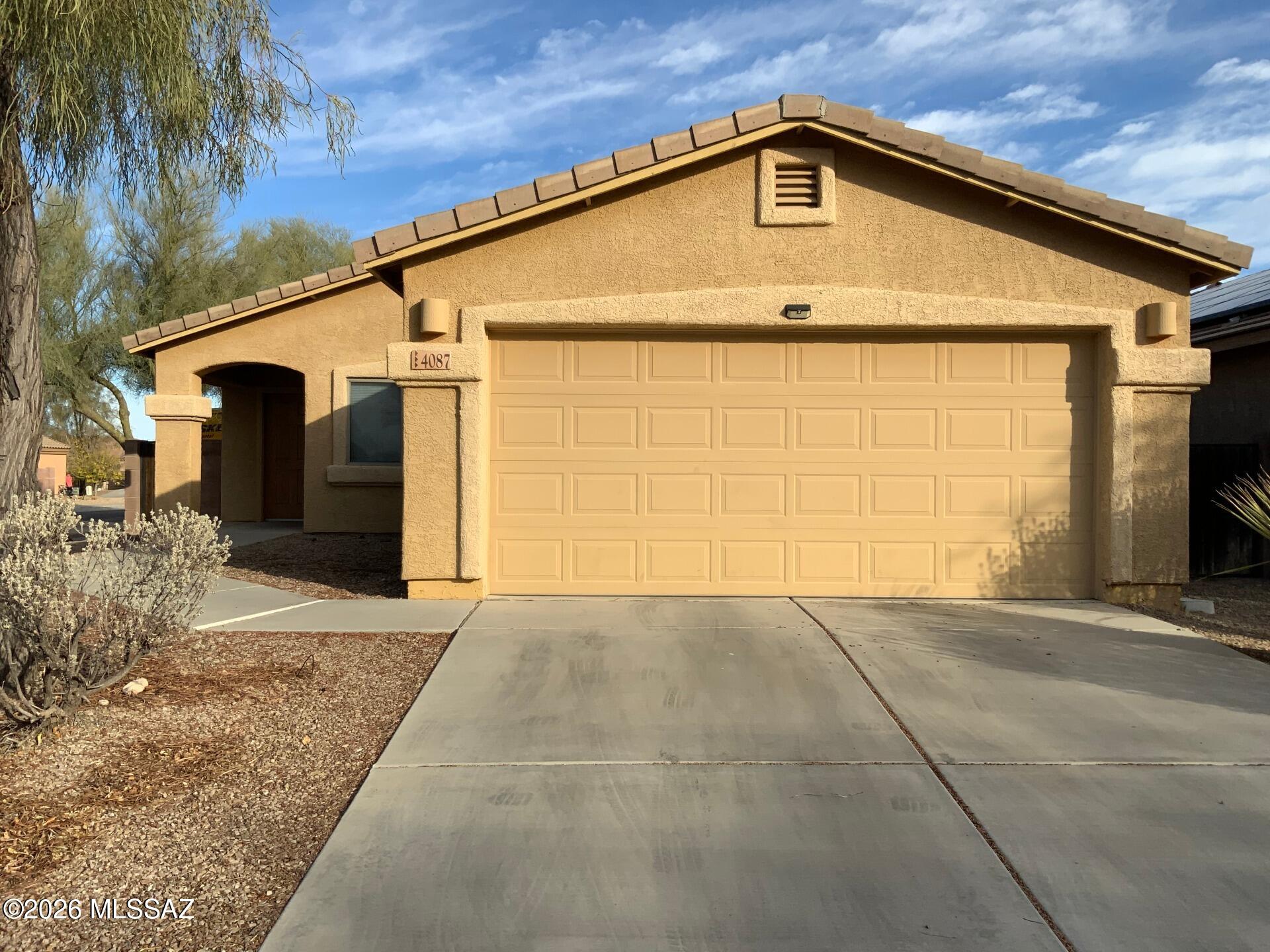 1,385 SQ FT! 3 bedroom, 2 bath home in Tucson's Valencia Reserve! Desirable single story floor plan. Charming kitchen with included appliances, & ample cabinetry/countertop space! Open concept living/dining. Neutral interior with vinyl flooring in all the right places! This home offers 3 nicely sized bedrooms. Primary suite with full bath + walk-in closet! Blinds + ceiling fans. Included washer/dryer! Enjoy a low up keep backyard with covered patio. 2 car garage! Located on a desirable corner lot with N/S exposure. Valencia Reserve is a well maintained community with biking/walking trails throughout!