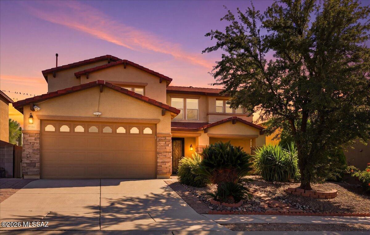 Seller is motivated and willing to consider reasonable offers and buyer concessions with an acceptable offer. Bring your offer and make this home yours! Spacious 5-bedroom, 3-bath home in Hartman Vistas with a versatile floor plan and plenty of room to spread out! The main level features formal living and dining areas, a separate family room, plus a downstairs bedroom and full bath--ideal for guests, a home office or multi-generational living. Upstairs, enjoy a large loft and spacious bedrooms offering even more flexible living space. Conveniently located in Northwest Tucson near shopping, dining and everyday amenities. Home has two AC units and both were put in 6 years ago.