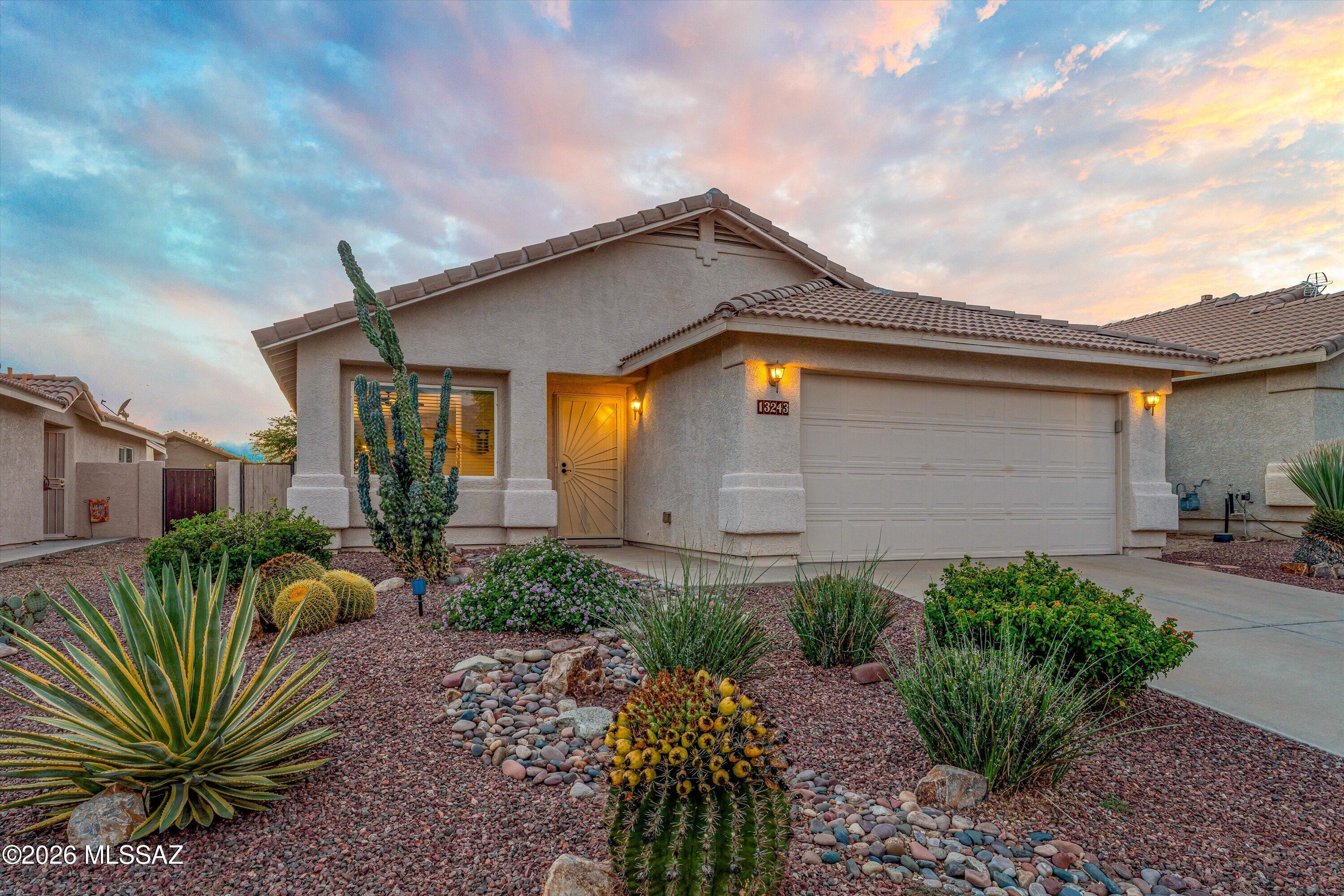 Welcome to 13243 N Mortar Pestle Court, a move-in ready 3 bed / 2 bath home in the heart of desirable Oro Valley, Arizona (85755). Offering 1,495 square feet of comfortable living space on a cut-de-sac street, this residence has been cared for with true pride of ownership and is immaculate throughout.
Step outside the front door to stunning mountain views. The backyard retreat features mature plants, manicured landscaping, and a covered patio with epoxy coating-- a serene, low-maintenance setting made for year-round Arizona living.
Enjoy the Rancho Vistoso lifestyle with low HOA fees in this desirable planned community, offering multiple community parks, tennis courts, walking trails, sidewalks, and impeccably maintained streets and common areas. Nearby access to the Vistoso Trails Nature Preserve, with a 6.2 mile concrete path amidst the beautiful desert landscape. Less than .5 mile from The Loop access point for biking, walking, etc.
All appliances convey, including the refrigerator, washer, and dryer -- just bring your furniture and settle right in.
Peace of mind comes standard: the roof is only 5 years old, and the HVAC system (7 years old) was recently serviced to ensure everything is running smoothly.
Ideally located in Oro Valley -- close to shopping, dining, golf, and hiking -- this is a rare opportunity to own a well-kept home in one of Southern Arizona's most sought-after communities.