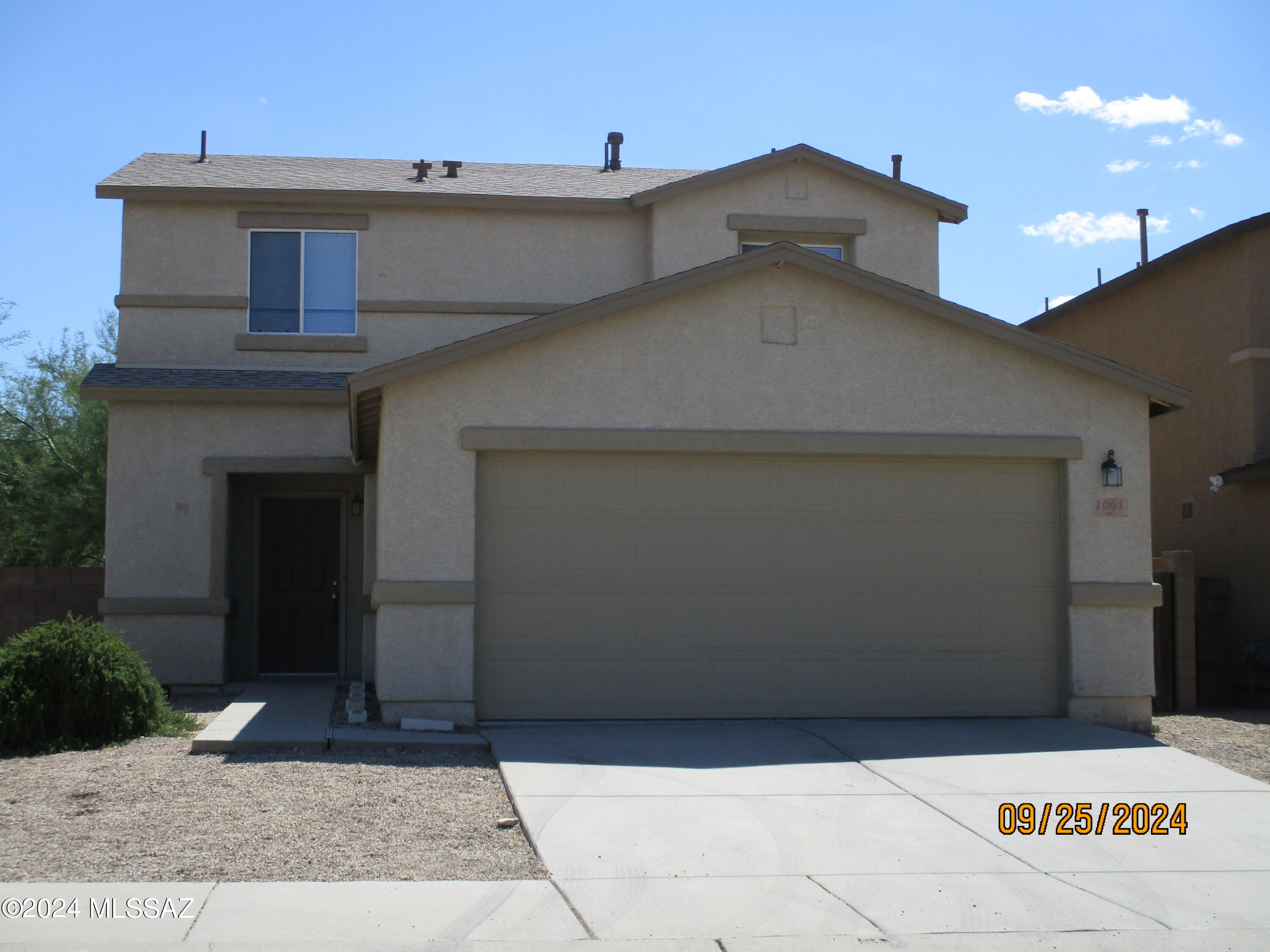 Great corner lot home that has a huge size backyard & patio, bright open floorplan and large kitchen, all bedrooms are located upstairs, subdivision has nice children's playground, close to bus lines, restaurants, shopping, I-10, Tucson Mall, very sought out area., This home is a must see, hurry before this one is gone, Iside photos to be added on Monday due to flooring being completed by tomorrow