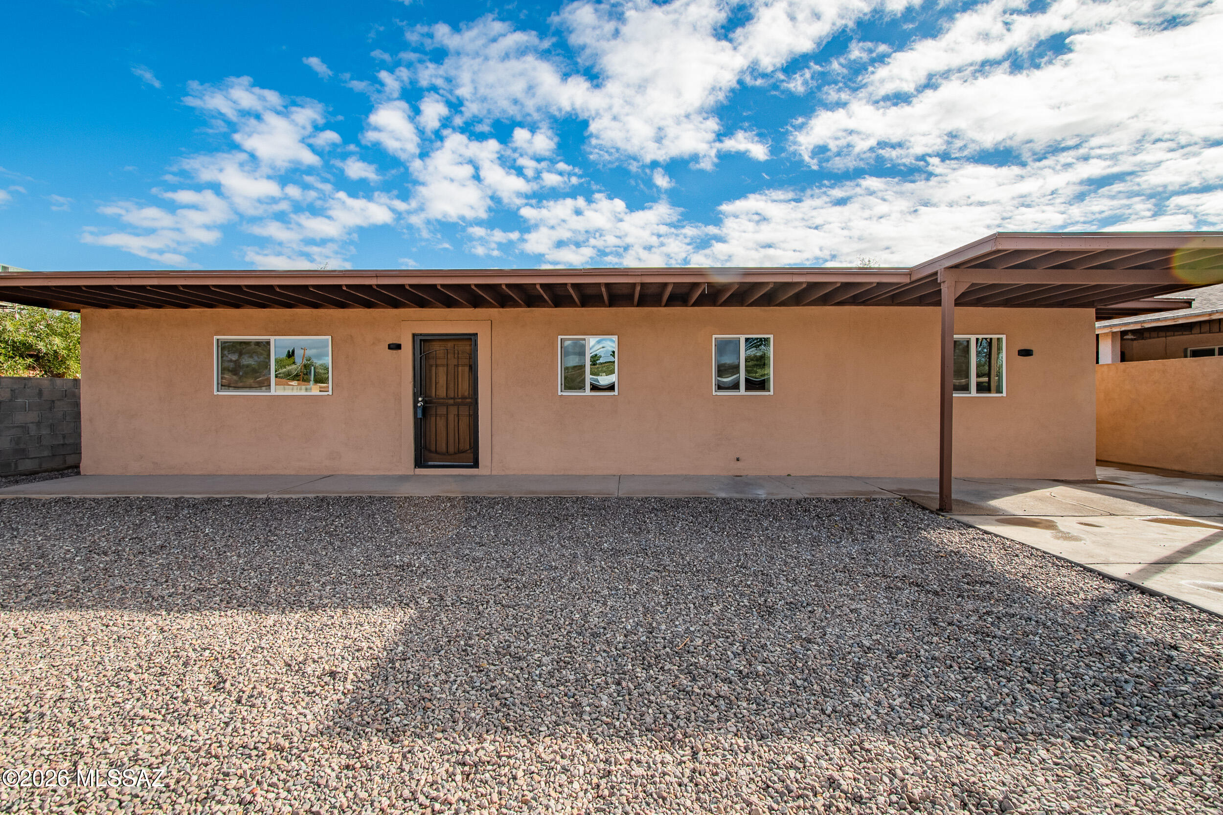 Seller to accept or counter offers between $319,900 - $335,900. Welcome to this light-filled, move-in-ready residence. It features a stunning remodeled kitchen with new modern cabinetry, granite countertops, a stainless steel gas range, dishwasher, microwave, updated lighting and fixtures, and an oversized island perfect for entertaining. Both bathrooms have been beautifully updated with new vanities, granite counters, designer tile showers, new fixtures, mirrors, and lighting. Interior improvements include fresh paint, new doors, baseboards, dual-pane windows, and updated electrical finishes. Major upgrades include a new electric multi-head unit, gas water heater, and built-in roof. Low-care landscaping and fresh exterior paint complete this turnkey home
