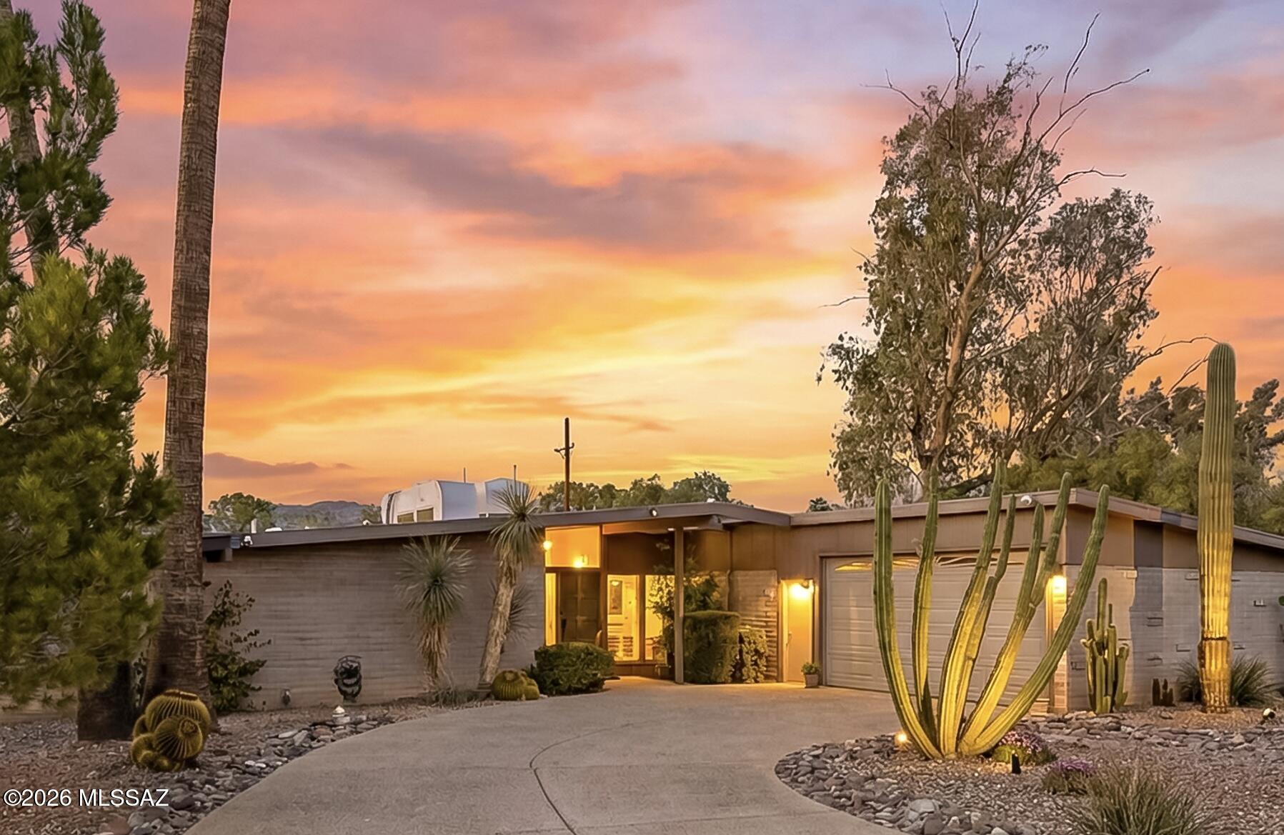 Experience the timeless appeal of this beautifully maintained 3-bedroom, 2-bath Mid-Century Modern home, where classic architecture meets thoughtful upgrades. Floor-to-ceiling windows flood the interior with natural light, seamlessly blending indoor and outdoor living. Striking beamed ceilings add warmth and character, enhancing the home's distinctive architectural style.
The updated kitchen features brand-new appliances and modern finishes, while both bathrooms have been tastefully renovated with clean, contemporary touches. Recent improvements include a new roof coating and newer A/C system for added comfort and efficiency.
Step outside to a generously sized yard--perfect for entertaining or relaxing in your own private retreat.  No HOA. The pool has been recently replastered and upgraded with new tile, creating a fresh, inviting centerpiece for outdoor gatherings.
Located in a neighborhood undergoing the process to become a designated historic district, there may be potential eligibility for property tax reductions.
This is a rare opportunity to own a true Mid-Century gem with modern updates and exceptional outdoor space.