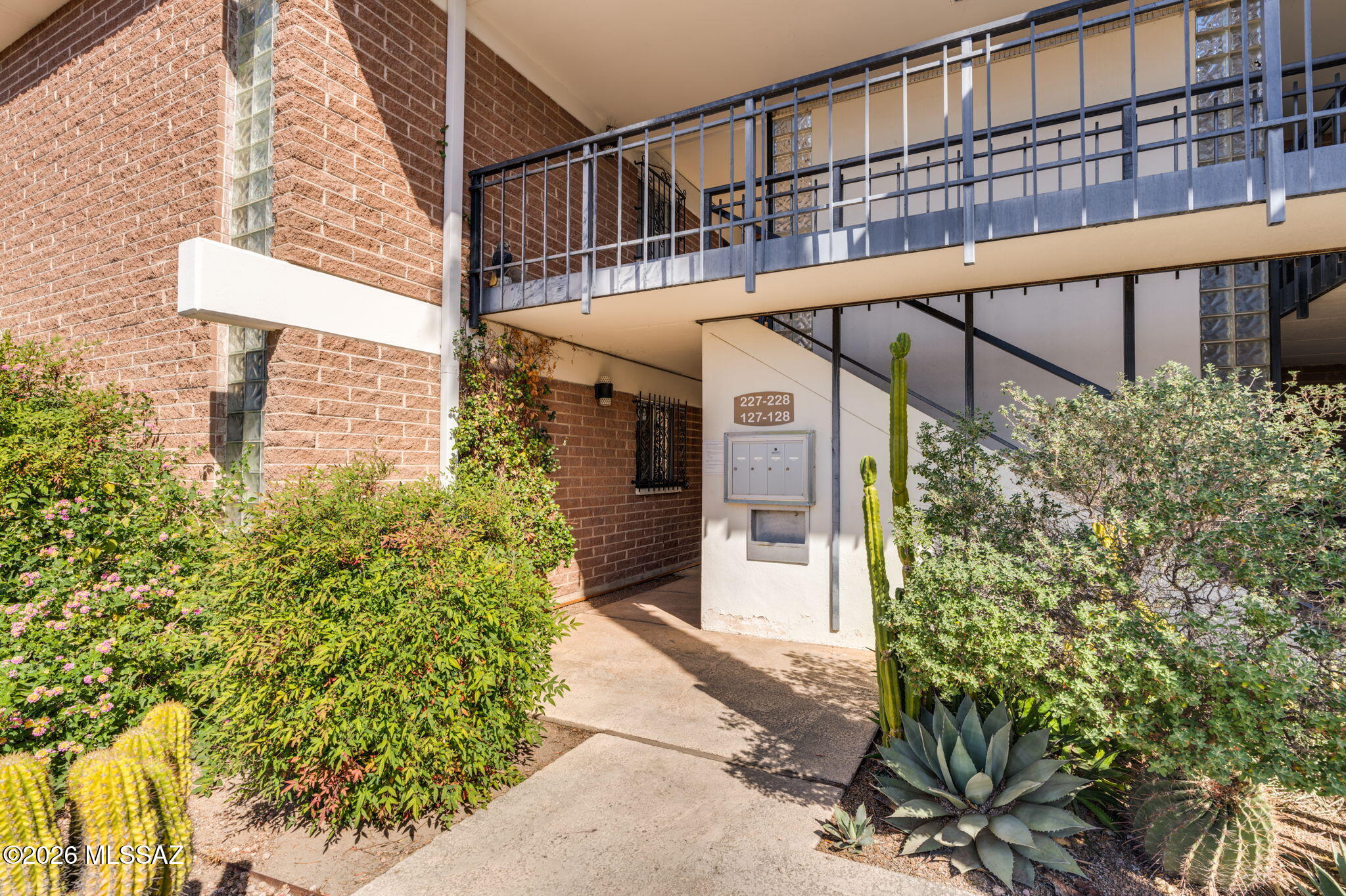 A great opportunity in the centrally located Eden Roc community, just minutes from the University of Arizona, Downtown Tucson, and the revitalized Broadway Sunshine Mile filled with new restaurants, shops, and local favorites. Reid Park is right around the corner offering golf, pickleball, walking trails, dog parks, and one of Tucson's best outdoor spaces. This ground level condo is offered fully furnished and comes with established rental history, making it an excellent option for an investment property, seasonal residence, or full time living. Inside, the spacious floor plan is one of the largest in the community and features bright living areas that open to both a private front patio and back patio. The split bedroom layout offers oversized bedrooms with walk in closets, and the guest bedroom has direct access to the back patio. A partitioned flex space provides additional versatility and can function as a third bedroom, office, or den. Washer and dryer are located in the unit and there is no carpet throughout.

The kitchen features rich cabinetry with pull out shelving and generous pantry storage for easy organization. All appliances convey, and a window over the sink brings in natural light while looking out toward the private courtyard, creating a bright and welcoming space to cook and gather.

Located just steps from the community pool and including a garage space, this property offers both convenience and flexibility in a quaint central Tucson location.