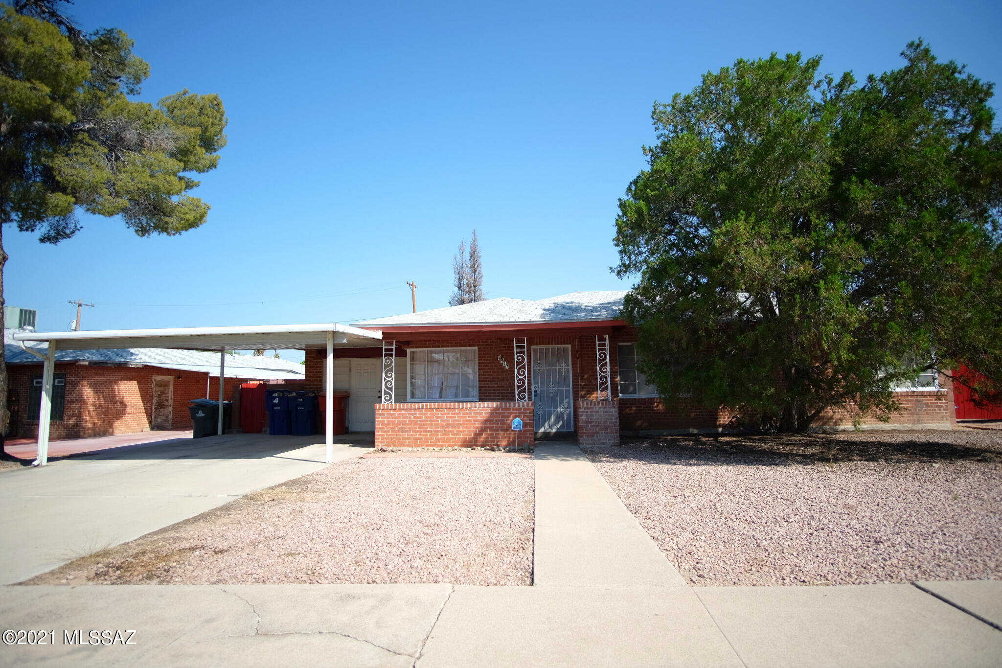 Text for a Walkthrough Video/more info. Freshly updated Central Tucson 4 Bedroom + Family Room/2 Bathroom brick One-story Home with 1706 sq ft of living space + oversized gated backyard. Central Air Conditioning, fresh paint, woodgrain tile floors, family room w/ fireplace, laundry hookups, and plenty of interior storage. Located near Hoffman Park, Bicycle Blvd, + Williams Center. 12mo minimum Lease. Costs incl; non-Refundable $50/adult Application, $1850 Security Deposit, $150/pet with approved pet, $400 cleaning. Tenant pays all utilities. Available immediately.