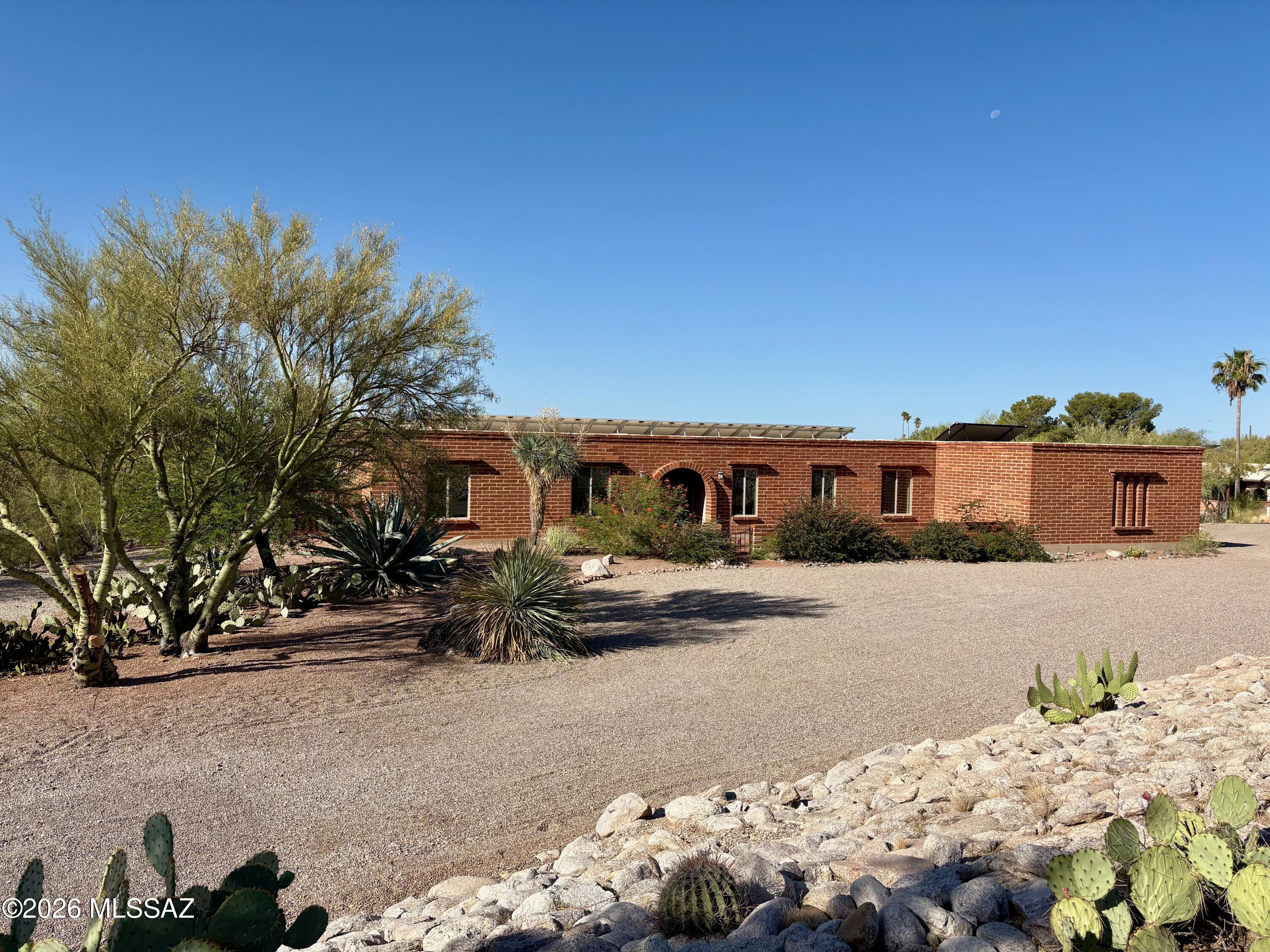 Welcome to your desert dream home. Nestled in the highly coveted foothills of Skyline Bel-Air Estates, this classic, burnt-Adobe ranch-style home is the perfect blend of timeless Tucson charm and modern luxury. It's got character, it's got views for days, and honestly, it's just showing off at this point.
Spanning a generous 2,730 square feet, this 5-bedroom, 3-bathroom split floor-plan home manages to be both grand and incredibly cozy. Whether you need space for a bustling household, a dedicated home office (or two), or a hobby room for your passion projects, this layout has you covered.
Why choose between the dramatic, rugged peaks of the Catalinas and the twinkling city lights below? Here, you get both. It's the ultimate backdrop for your morning coffee and your evening cocktail. Fully owned solar!
The backyard is a private oasis featuring a swimming pool/spa, perfect for floating the days away or hosting weekend barbecues.
The burnt-Adobe exterior offers that natural insulation that brand new houses just can't replicate. It's chic, it's grounded, and it's undeniably "desert modern."
A spacious 2-car garage rounds out the property, offering plenty of room for your vehicles, gear, or storage.
Charming, solid, and sitting in one of the best zip codes in town--this Adobe gem is ready for its next chapter.
