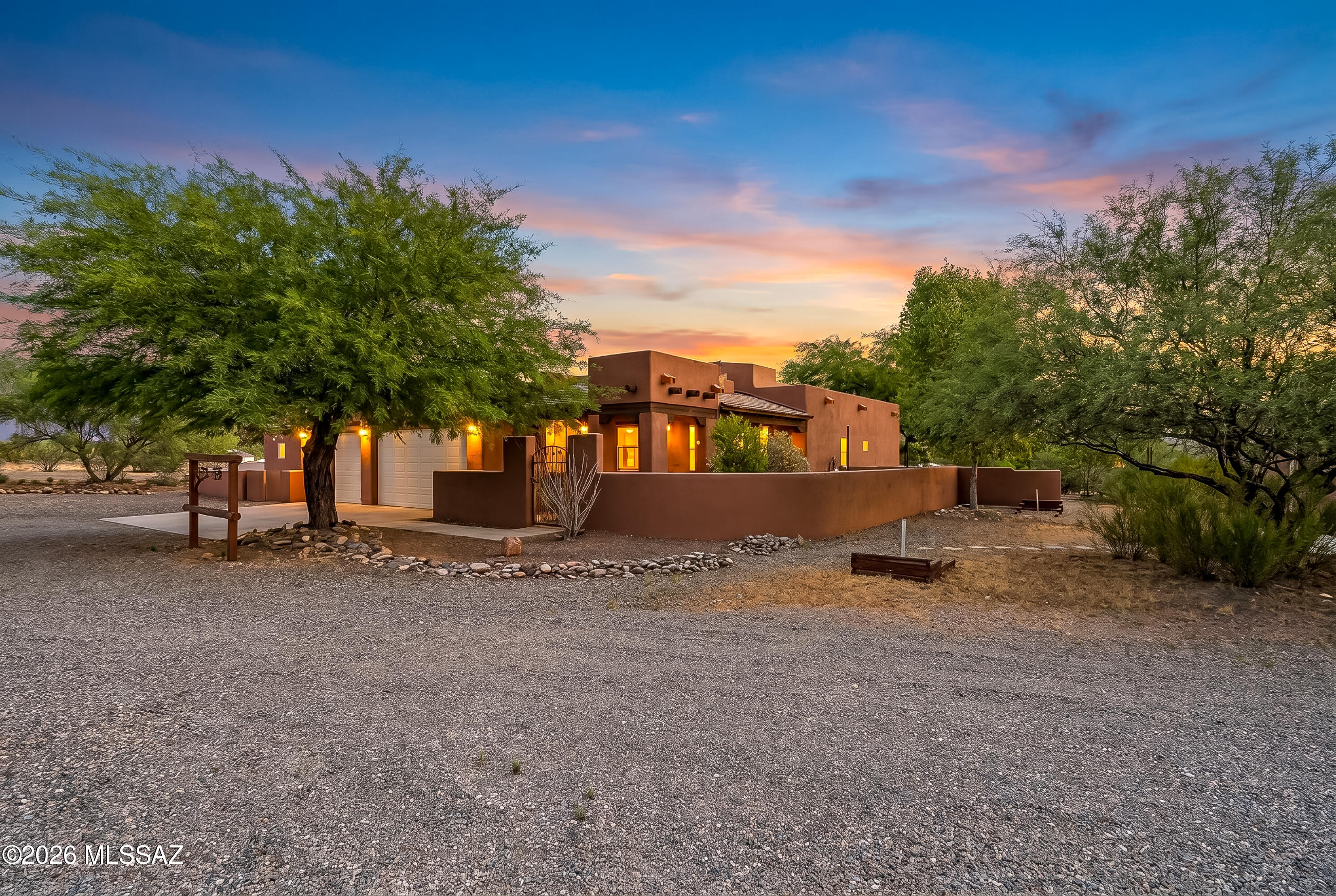 Your search is over! Welcome to your dream home on a sprawling lot with breathtaking open views. With a front courtyard & inviting entry creating a warm first impression. Inside, you'll find a spacious open floor plan with ceramic tile flooring in all the right places. A chef's kitchen features a breakfast bar which flows seamlessly into the great room, perfect for entertaining, including a good sized primary suite, two additional bedrooms one with attached bath. Step outside to an amazing backyard retreat with stunning mountain views and endless possibilities for outdoor enjoyment. Complete with attached 3-car garage & a large detached garage/workshop & full RV hookups, this exceptional property offers space, functionality, and scenic beauty. Don't miss the opportunity to make it yours!