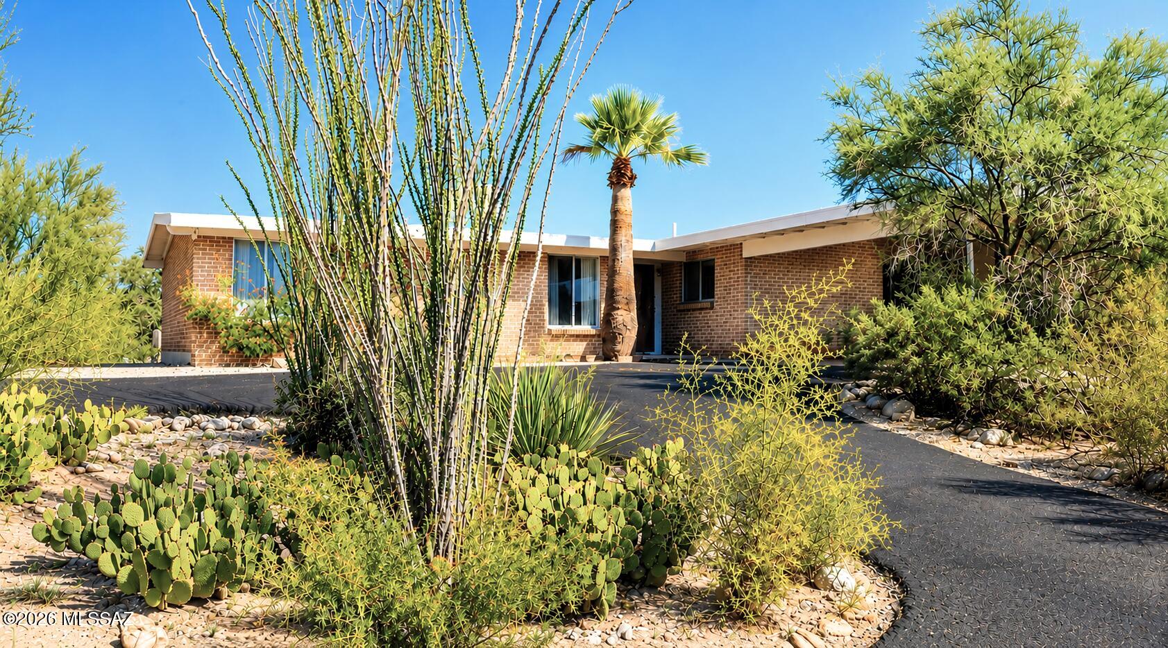 Tucked away down a lengthy, private driveway on a quiet one-acre cul-de-sac, this beautifully updated, move-in ready home offers the perfect blend of modern updating and peaceful privacy. Held by the same family for 59 years, this rare gem combines extensive remodeling with a highly desirable NW location-all with no HOA! New energy efficient A/C and heating systems plus a fully upgraded 200-amp electrical panel. Brand new interior and exterior paint complimented by modern interior doors, stylish hardware, new ceiling fans and contemporary light fixtures throughout. Stunning wood-look luxury-vinyl plank flooring flows through the home.  Stainless steel GE refrigerator and brand-new dishwasher included. New roof coating that includes a transferrable 3 year warranty. The large walled in bac yard is perfect for pets, play or adding a pool. Enjoy bug-free desert evenings from the comfort of your large screened in patio.
Super convenient Northwest location just minutes from shopping, dining and entertainment.