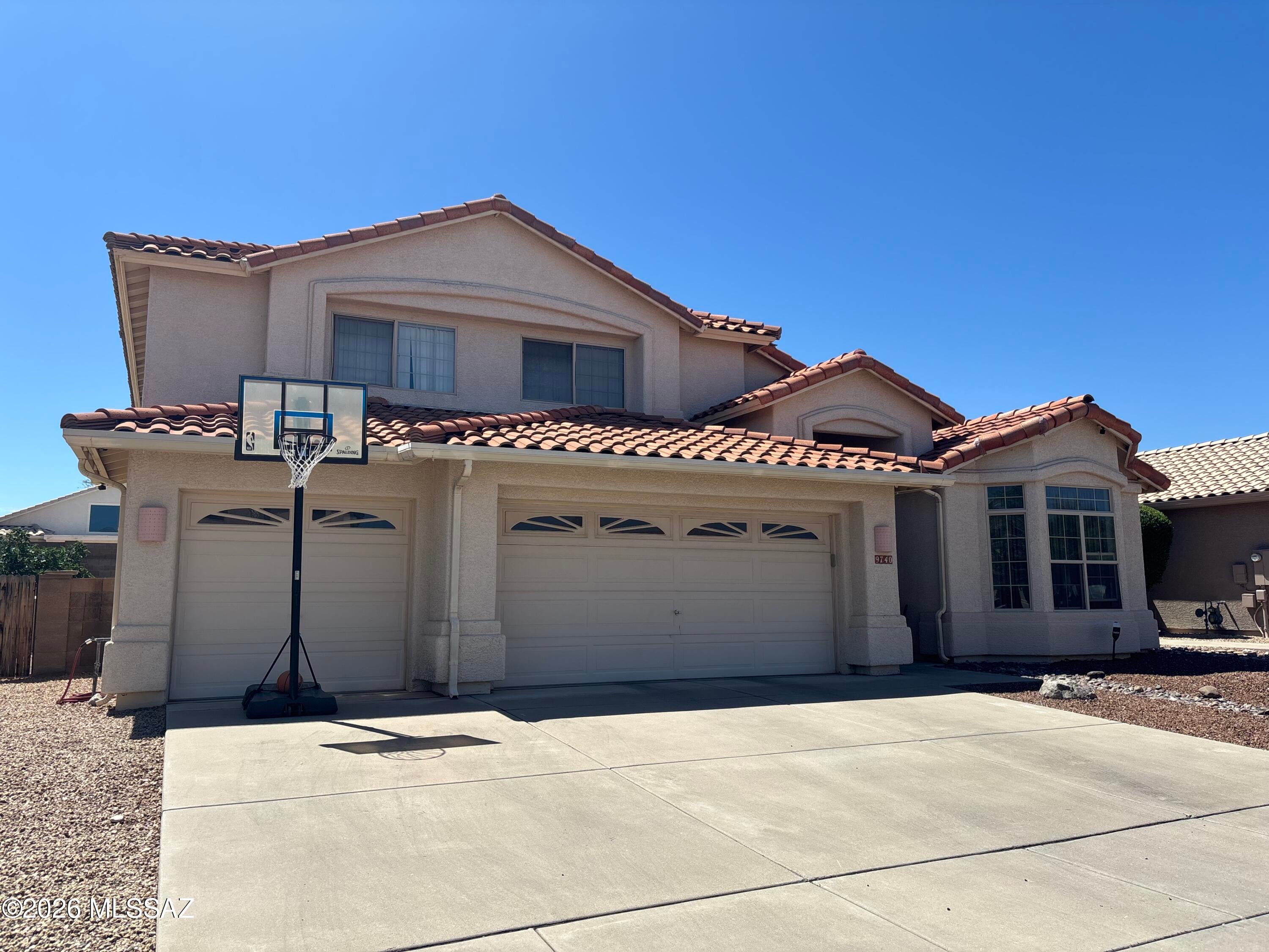 Tucked into the coveted Harrison Pointe housing Community, this spacious 5-bedroom, 3-bathroom home will tick all of your boxes. With a flowing waterfall pool, to the 3-car garage, it has something for everyone! All new tile flooring, paint, and an updated stone fireplace mix beauty with function. The open kitchen and great room are perfect for entertaining, while the retreat-like primary bedroom and bathroom is like an oasis from the stresses of everyday life. Check out this amazing property before it?s gone! Your dream home awaits!! Sellers are licensed realtors in the state of Arizona