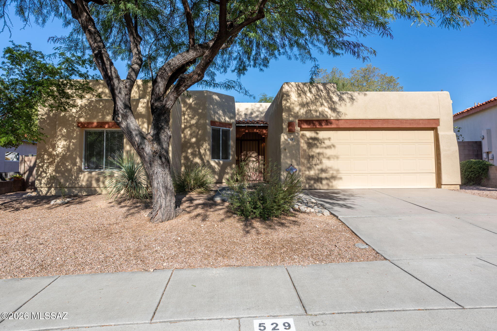 Located in the highly sought-after Rancho Arboleda community , this desirable 2080 floor plan offers the perfect blend of comfort, convenience, and foothills living. Nestled in a prime north-central foothills location, residents enjoy access to a community pool & an ideal Tucson lifestyle just 10-15 minutes from Interstate 10, UofA, downtown & LaEncantada shopping & dining. Expanding beyond the 2,080 SF reported by the Assessor, the home also features a finished 305SF bonus room, bringing the total heated & cooled living area to nearly 2,400SF. The interior was painted in 2023 & recently refreshed with touch-up painting, updated light fixtures, new cabinet hardware,& new carpet in 1 bedroom. A charming side pocket view of  the Catalina Mtns gives just the right touch of scenic inspiration.