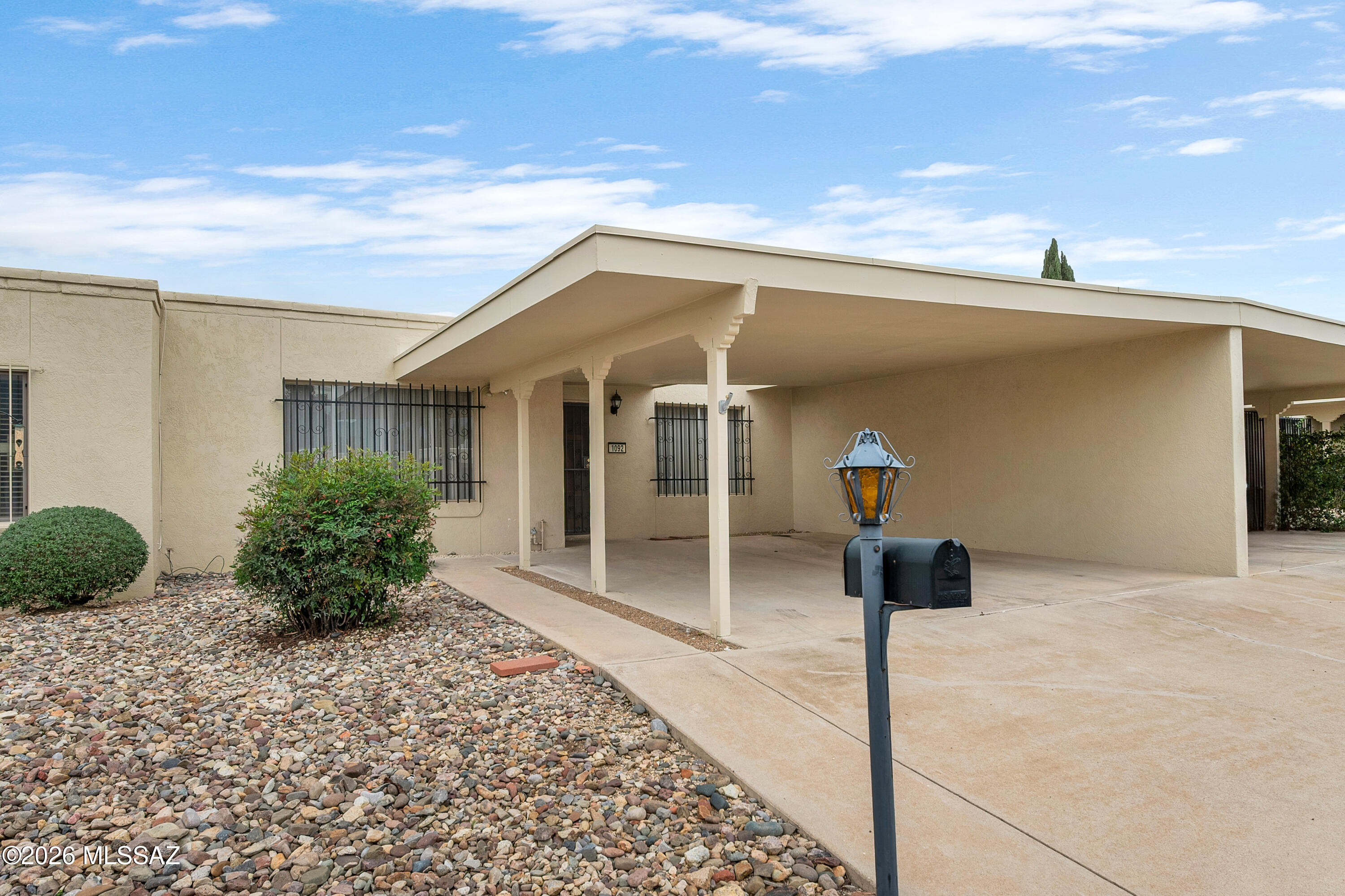 Look no further-this beautifully maintained single-story townhome in El Dorado Hills! This is the opportunity you've been waiting for. Perfectly positioned at the end of a quiet cul-de-sac, this residence offers the privacy, natural light, and thoughtful updates today's buyers are seeking-whether you're looking for a full-time Arizona retreat of the ideal lock-and-leave winter escape. From the moment you step inside, you're welcomed by a spacious living room filled with abundant natural light, enhanced by multiple skylights that brighten the home throughout the day. A custom interior palette, fresh paint, and the removal of popcorn ceilings create a clean, modern feel that immediately sets the property apart. Tile flooring flows through the main living areas for easy maintenance, while plush new carpeting in the bedrooms provides comfort where it matters most. Ceiling fans and dual-pane windows add both efficiency and year-round comfort. The formal dining area offers the perfect setting for hosting memorable dinners and gatherings, seamlessly connecting to a well-appointed galley kitchen featuring stainless steel appliances, generous cabinetry with crown moulding, and ample counter space for meal preparation. Whether entertaining guests or enjoying a quiet evening at home, this layout delivers both functionality and charm. The primary suite is generously sized and designed with comfort in mind. It features direct access to the outdoor patio, a spacious walk-in closet, and a private en-suite bath complete with a modified, easy-access shower/tubthoughtfully designed for convenience and comfort. The secondary bedroom also benefits from natural light and fresh new carpeting, creating a welcoming environment for guests or a home office. Step outside to your fully enclosed covered patioan inviting and private outdoor space ideal for morning coffee or relaxing evenings while staying shaded from the Arizona sun. With its cul-de-sac placement and serene surroundings, this home offers a true sense of retreat. Additional highlights include included washer and dryer, abundant storage, and meticulous maintenance throughout. This immaculate property is truly move-in ready and competitively priced to sell. Opportunities like this don't last. If you've been searching for a private, updated single-story townhome that offers both comfort and convenience, this is the one. Schedule your private showing today and experience firsthand the lifestyle this El Dorado Hills gem has to offer.