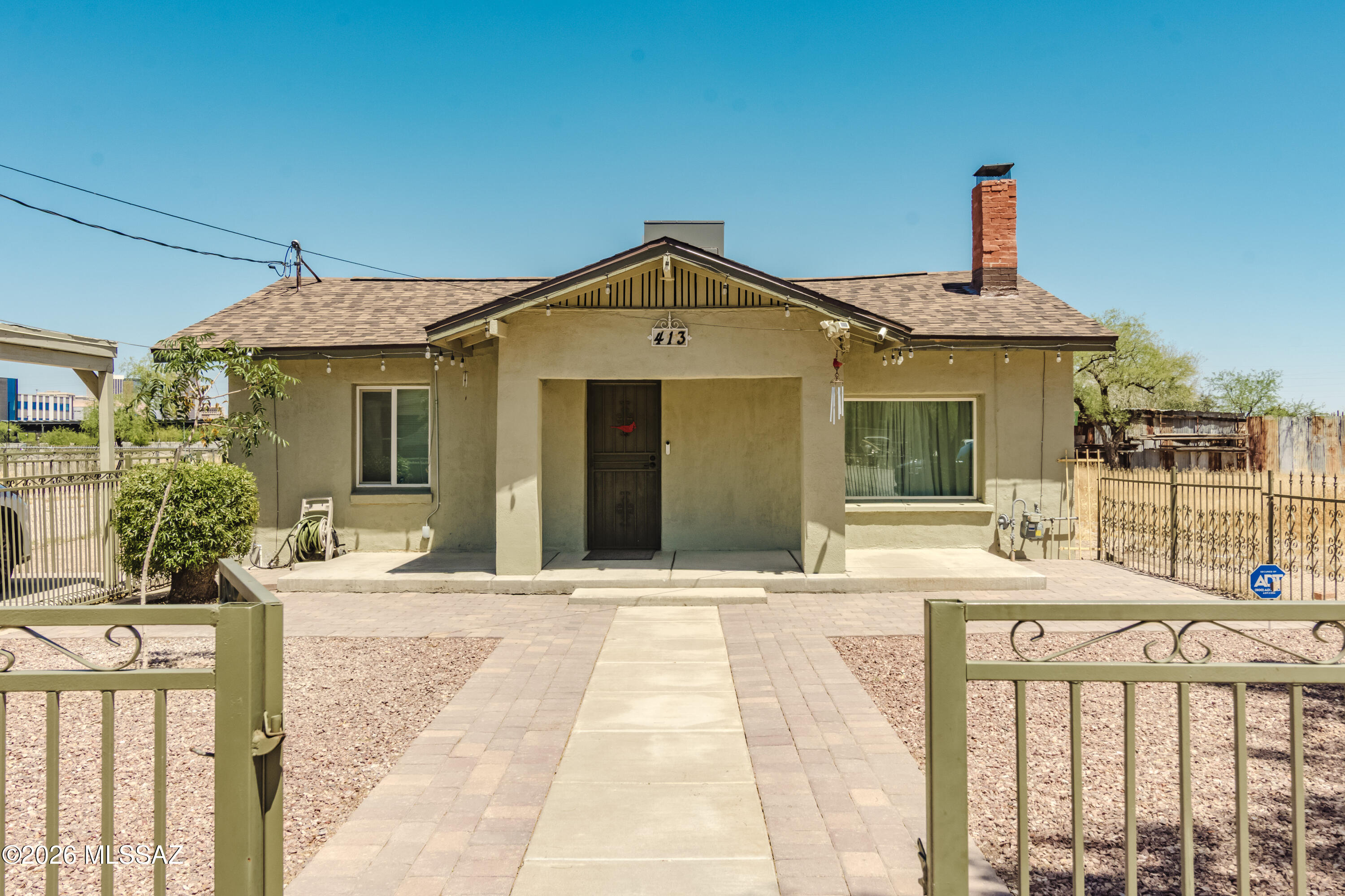 What a charmer & right in the heart of downtown's Mercado. Newly remodeled and ready to move into. Starting at the top with a new metal roof, windows, kitchen (all new cabinetry, fixtures, appliances) bath (new shower, vanity, faucet, toilet) Luxury vinyl flooring throughout, decked out main bdrm. closet, 2 & 1/2 ton HVAC system, interior drywall & paint, stucco repair, gas insert at FP, electrical upgrade / 220 Amps) some new plumbing & system flushed, addition of ceiling fans. Open floor plan with dining area & sweet living room. 16' X 16' storage shed & tuff shed that houses laundry. Close access to UA, Mercado & downtown shops & night life, trolley car, & I-10. R-2 lot for expansion makes this a great pkg. Let's make a deal.
