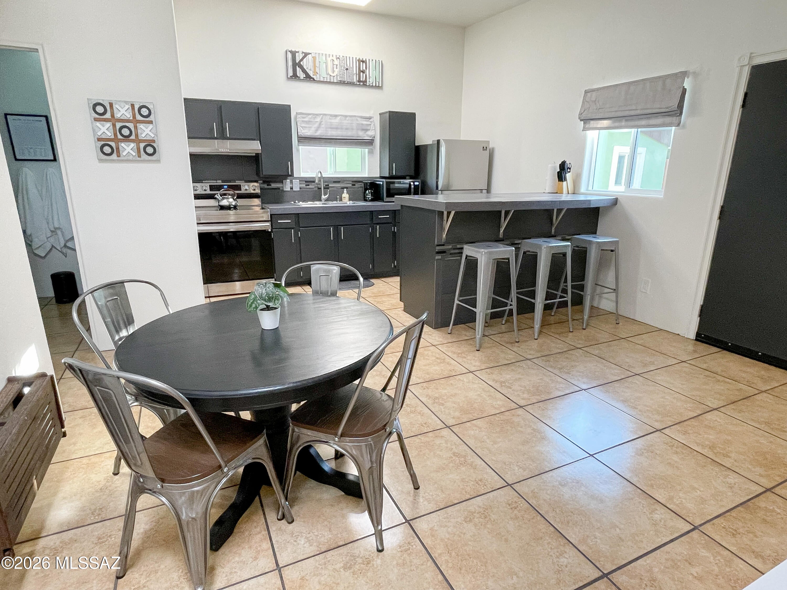 Exceptional Investment Opportunity Near the University of Arizona!

Don't miss this versatile and income-producing fourplex in one of Tucson's most desirable rental corridors. Situated just minutes from the University of Arizona and adjacent to the popular Mountain Avenue bike path, this unique property offers a rare unit mix featuring a spacious 3-bedroom main home plus three 1-bedroom units, creating multiple income streams and broad tenant appeal. 

Whether you're an investor looking to expand your portfolio or an owner-occupant interested in offsetting your mortgage by living in one unit while renting the others, this property delivers exceptional flexibility. The approximately 2,636-square-foot property sits on a generous quarter-acre lot and offers easy access to the university, downtown Tucson, shopping, restaurants, and major employers. 

With strong rental demand driven by its prime central location, this property presents an outstanding opportunity for long-term appreciation and consistent cash flow. Add it to your portfolio or make it your next house hack--opportunities like this don't come around often.