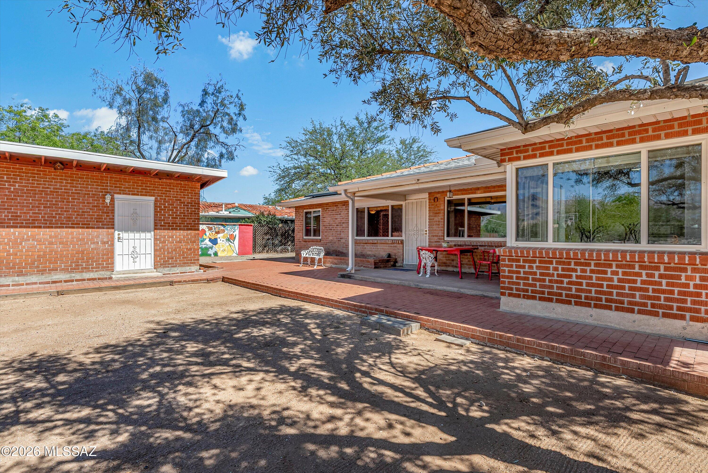 3 bed, 2 bed home with a GUEST HOUSE on a generous .8 acre lot in the desirable Richland Heights neighborhood. Features include dual-pane windows, ceramic tile throughout, dual kitchen sinks, and classic MID-CENTURY wooden doors. Enjoy a wood-burning fireplace, spacious extended garage, and a 5-year roof warranty. Guest house is ready for customization, plans available to add a kitchen. Leased solar saves hundreds per month - Avg electric bill is less than $3 per day! Enjoy mountain views from your supersized North facing backyard and gazebo.