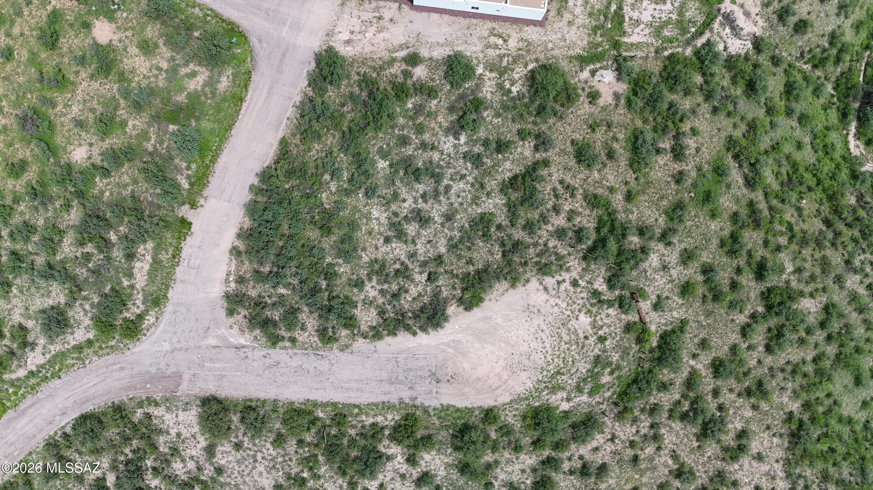 Great location. Residential building lot on the East side of Rio Rico. There are many homes built along this street so the water line should be in the street and power poles are there. This lot is on a corner/cul-de-sac.
