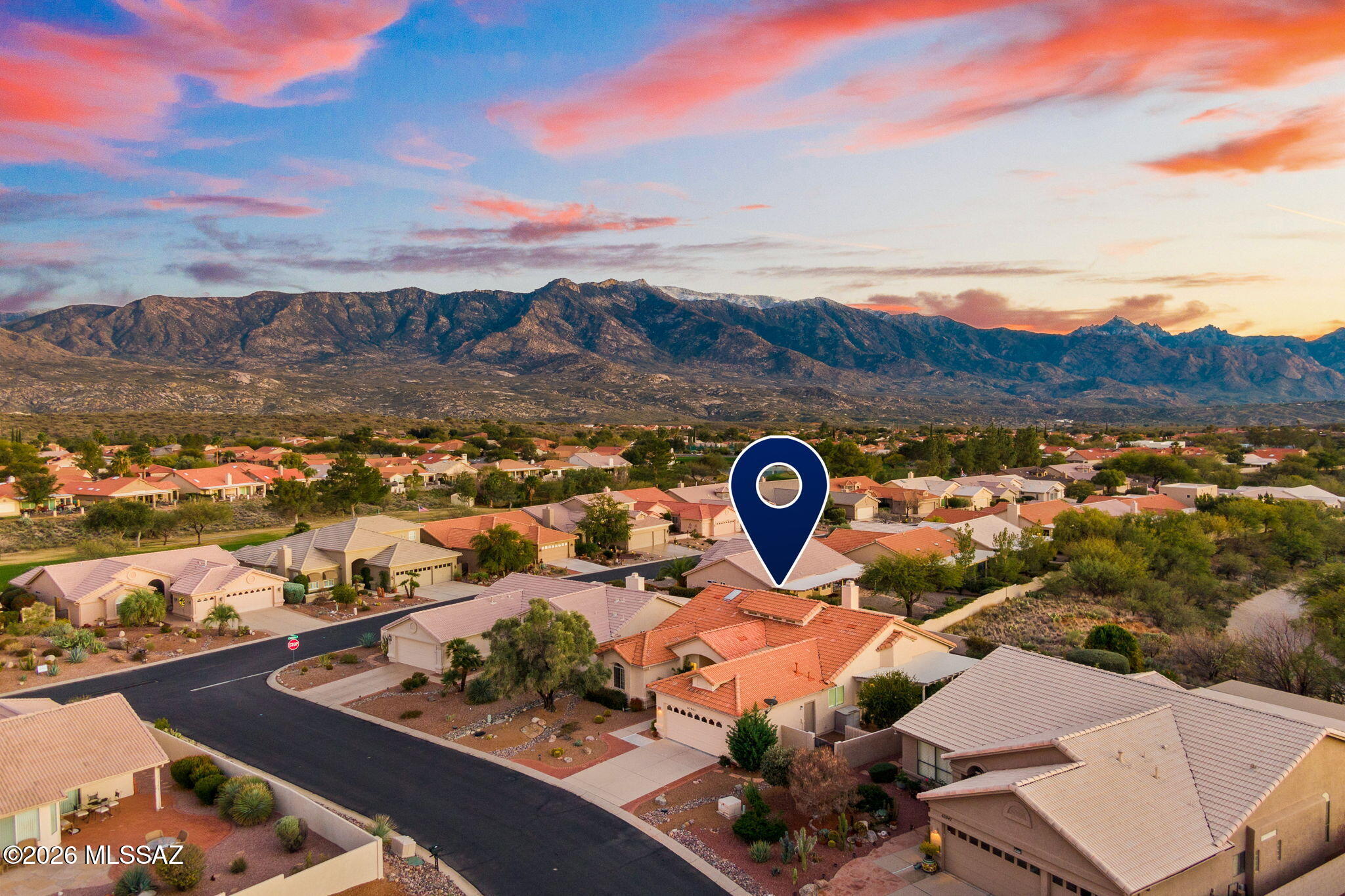 Welcome to this beautifully maintained Estancia model in the highly sought-after active adult community of SaddleBrooke, perfectly positioned to capture breathtaking Catalina Mountain views and unmatched privacy with no homes directly behind thanks to the lush greenbelt backdrop.

This light-filled home features soaring vaulted ceilings and expansive picture windows that frame panoramic desert and mountain scenery, creating an open and inviting living space. The split, open floor plan offers two spacious bedrooms, two full bathrooms, plus a generous office that could easily be converted into a third bedroom.

The kitchen is designed for both function and entertaining, showcasing Grand Canyon-hued granite countertops, a center island, ample cabinet space, and a breakfast nook that opens to the family room and covered patio. A dual-sided fireplace separates the living and recreation rooms, adding warmth and charm while maintaining an open feel. The formal dining area also enjoys stunning mountain views, making every meal feel special.

The primary suite is a true retreat with vaulted ceilings, space for a king-size bed and sitting area, a large walk-in closet, dual-sink vanity, walk-in shower, and a luxurious soaking tub. Two covered patios provide ideal spaces for outdoor dining, morning coffee, or relaxing while taking in the serene desert landscape.

Major recent upgrades include a full roof renewal completed October 2024 featuring new concrete tile, premium self-sealing underlayment with a 30-year warranty, elevated battens for improved ventilation and drainage, new flashing, new roof vents, new skylight dome, and inspected roof sheathing in like-new condition. Additional improvements include fresh exterior paint, seven freshly painted interior rooms, new screen doors and screens, ceiling fans, updated lighting in both bathrooms, new toilets, kitchen sink faucet, irrigation lines, garbage disposal, circuit breakers, GFCIs, and a new programmable thermostat. 
The oversized two-car garage offers extra storage and space for a golf cart or workbench, plus abundant cabinetry for tools and hobbies.

Enjoy the resort-style lifestyle SaddleBrooke is known for, with multiple pools, fitness centers, golf courses, pickleball and tennis courts, restaurants, hiking clubs, social clubs, concerts, and endless activitiesall surrounded by spectacular mountain views.

Move-in ready, extensively updated, and ideally locatedthis is Arizona living at its best.