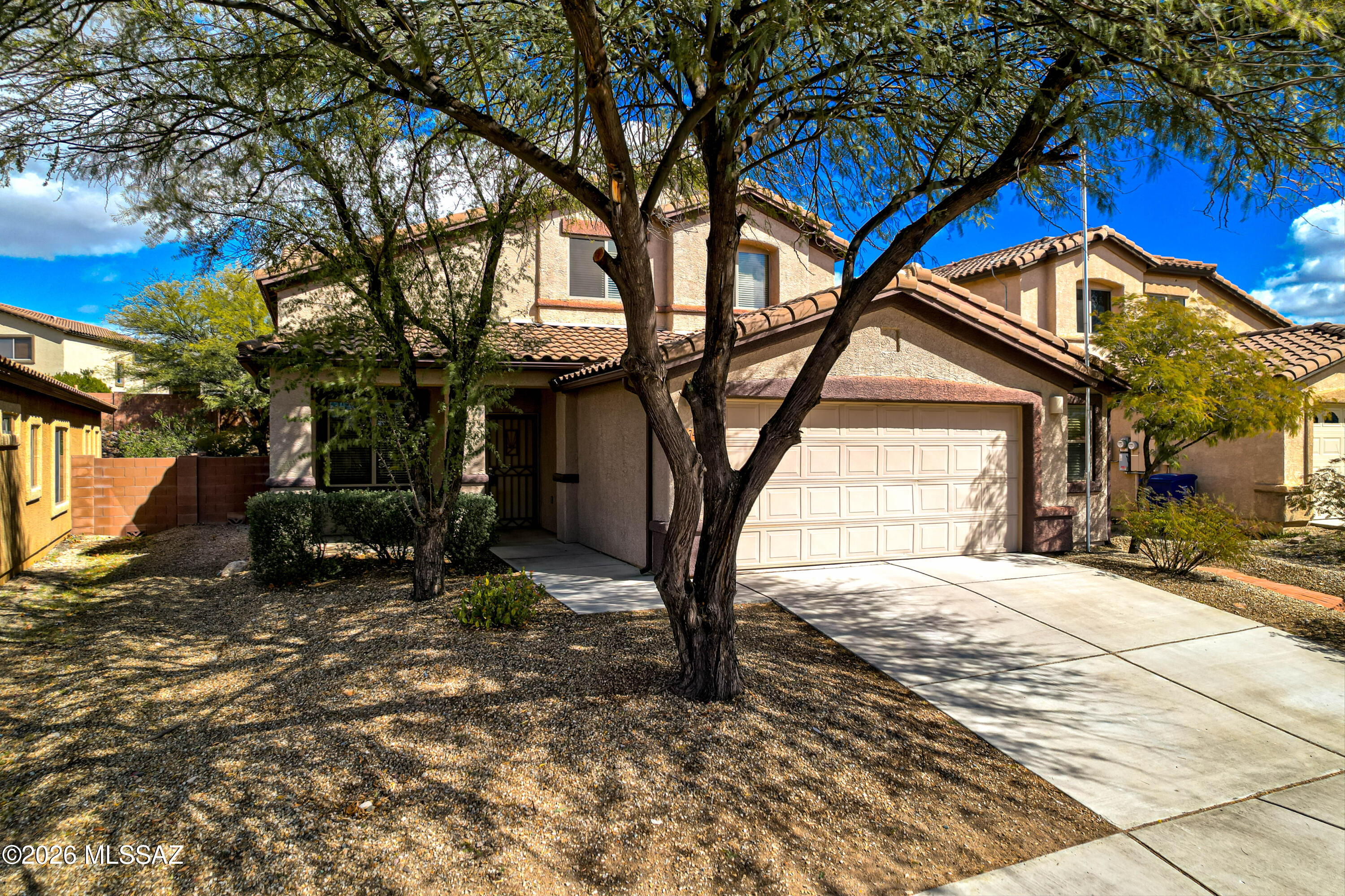 Located in the quiet, highly desirable Sycamore Park community, this beautiful two-story home offers 3 bedrooms plus a spacious den that can easily convert to a 4th bedroom and 3 bathrooms. The flexible floor plan is ideal for families, guests, or a home office. Enjoy no carpet throughout for a clean, modern look and easy maintenance, along with a water softener for added comfort and efficiency. Built-in BBQ and mature shade trees in the front and back create inviting outdoor living spaces perfect for entertaining. Extra-wide, extended-length garage provides ample room for vehicles, storage, or hobbies. Community Park directly across the street with basketball courts, softball and soccer fields, BBQ areas, dog park, with greenest grass in the city. Move-in ready and a must see!