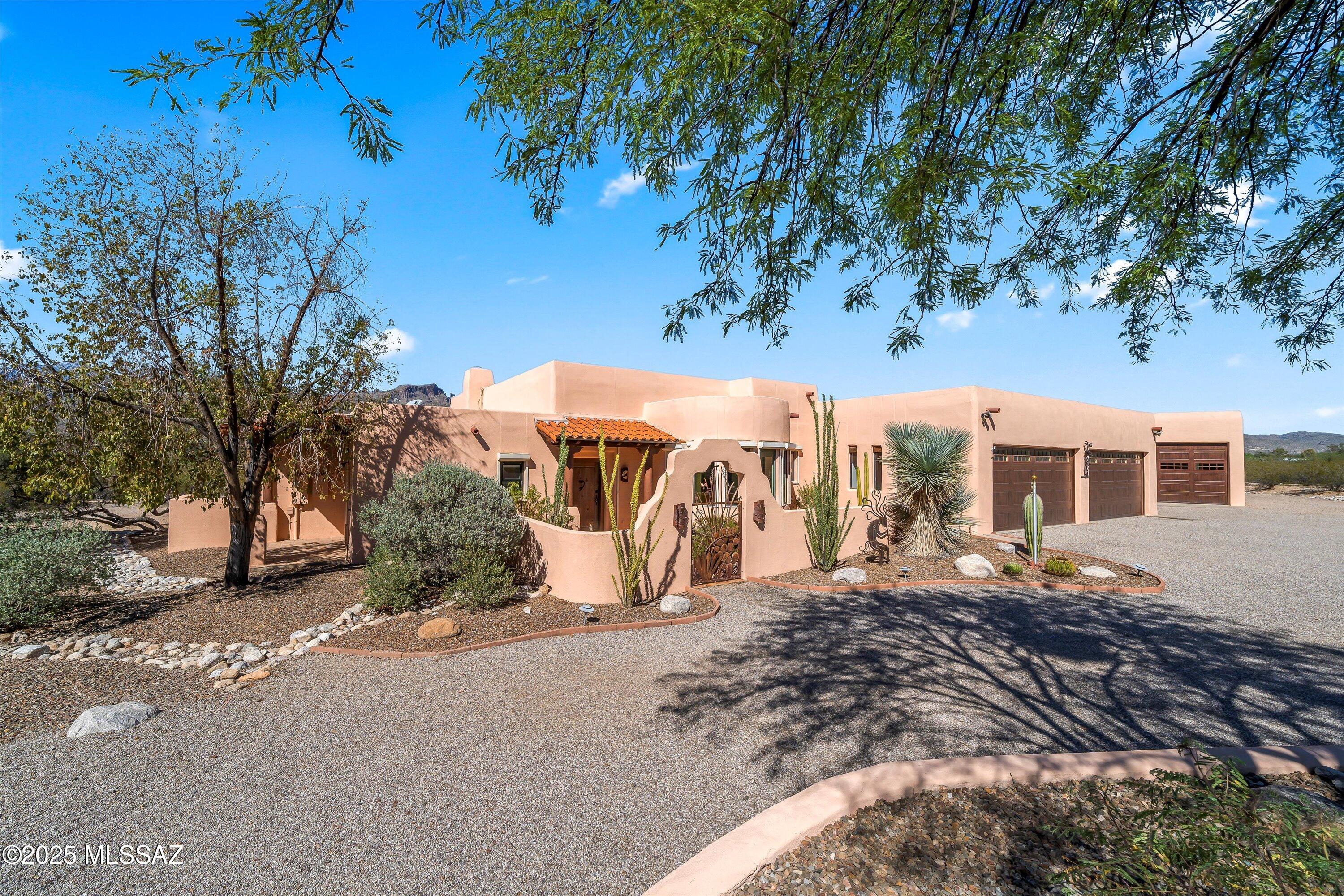 Opportunities like this don't come up often in Northeast Tucson--3.7 acres, Catalina Mountain views, and a total of 6 garage spaces, including a detached oversized garage/workshop, all tucked at the end of a peaceful cul-de-sac. This single-level home offers nearly 3,000 sq ft, including 3 bedrooms, a flexible bonus space, and multiple living areas. The family room and primary suite capture the most prominent mountain views, while the rest of the home offers space, functionality, and flexibility. Ideal for those needing space for vehicles, hobbies, or a workspace, this property offers a solid foundation for customization over time and a unique opportunity for the right buyer. The layout is designed for both everyday living and flexibility, with multiple living and dining areas that can adapt to a variety of needs. The family room and primary bedroom are positioned to take advantage of Catalina Mountain views, creating inviting spaces to relax and unwind, while other areas of the home offer functional space ready for personalization.

One of the standout features of this property is its versatility. In addition to the attached garage spaces, the detached garage/workshop (approximately 26' x 32.5') offers excellent potential for hobbies, storage, or workspace complete with RV Hookups offers meaningful flexibility for a variety of uses, depending on your needs.

The nearly 4-acre parcel offers room to expand, create outdoor living areas, or simply enjoy the privacy and open space that is increasingly difficult to find. Zoned for horse use, the property also offers the option to accommodate equestrian needs through future improvements, while currently offering a wide range of possibilities for use.

Located in the desirable Northeast Tucson area, the home offers convenient access to local amenities while maintaining a quiet, tucked-away setting. Whether you're looking to create a private retreat, need space for your lifestyle, or want a property with long-term potential, this is a unique opportunity to make it your own.