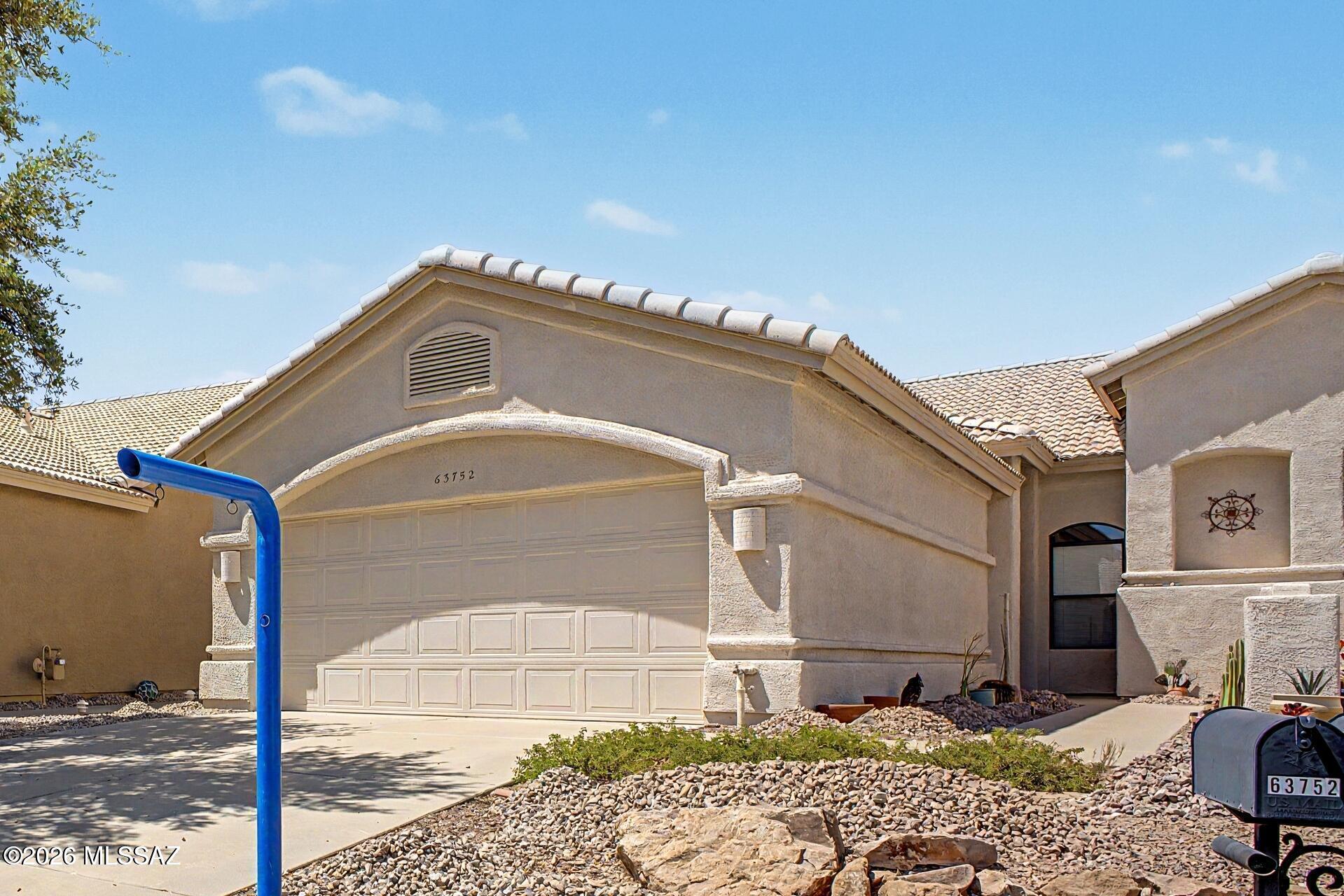 **TAKE ADVANTAGE OF THIS PRICE REDUCTION**   Enjoy easy living in The Villas of SaddleBrooke, a highly sought-after active adult resort-style community just north of Tucson. The Villas Association takes care of many exterior maintenance responsibilities, including the roof, irrigation system, landscaping, pest control, exterior insurance coverage, and even monthly driveway and yard cleaning--allowing you more time to enjoy the exceptional lifestyle SaddleBrooke offers.

This light-filled, impeccably maintained Villa is move-in ready and features newer carpeting, abundant storage, and a charming Arizona Room perfect for relaxing and enjoying the beautiful desert surroundings.