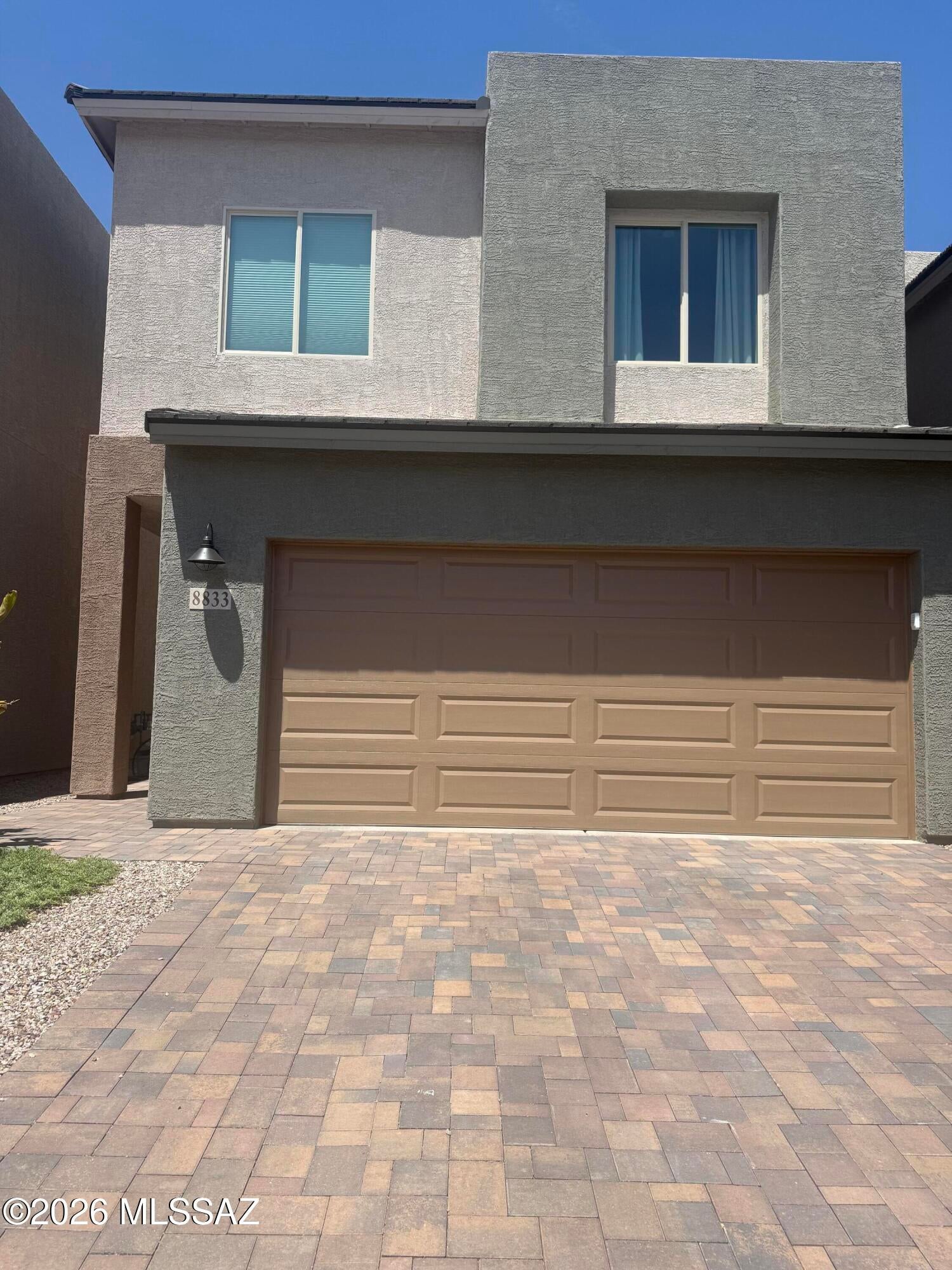 Almost new! Beautiful modern extra features that make this home special! his modern cozy home was built in 2025/2026, its a small subdivision (Sierra Pointe) in Continental Ranch. Home has 2 Car garage with a paver driveway, nice neutral colors, high ceiling windows for extra lighting, a large open breakfast island/bar to accommodate guests. Granite countertops, stainless steel appliances. Bedrooms are super spacious! One has a walk in closet, Master bath with double sink vanity and subway tile and long windows for lighting. Rear yard has a nice area of turf and pavers to sit and enjoy a cookout on a built in BBQ with space to entertain or simply have a relaxing evening. Mature trees have been planted to haves some shade and citrus limes & lemons! Motivated Agent/Owner