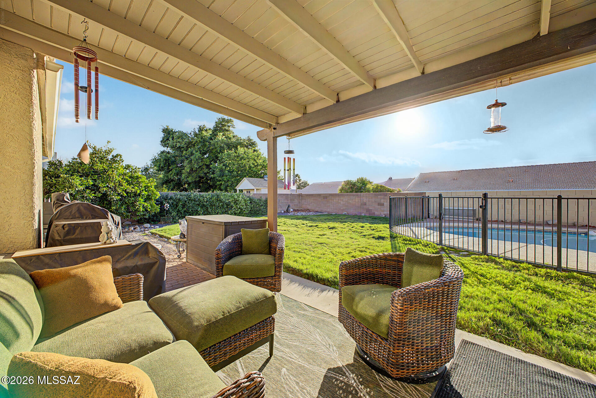 Welcome to this beautifully maintained 3 bedroom, 2 bathroom home in the highly desirable Rita Ranch community with NO HOA! This move-in ready property features numerous updates, including newer HVAC, water heater, and appliances for added peace of mind. Step outside to enjoy the newly resurfaced sparkling pool with a new pool pump, perfect for relaxing or entertaining year-round. Inside, the spacious floor plan includes a large bonus room offering endless possibilities for a game room, home office, or second living area. The bonus room opens directly to the expansive covered patio and backyard oasis, creating ideal indoor-outdoor living. Conveniently located near parks, schools, shopping, and dining, this home is a must see! Don't miss your chance to own this lovely property!