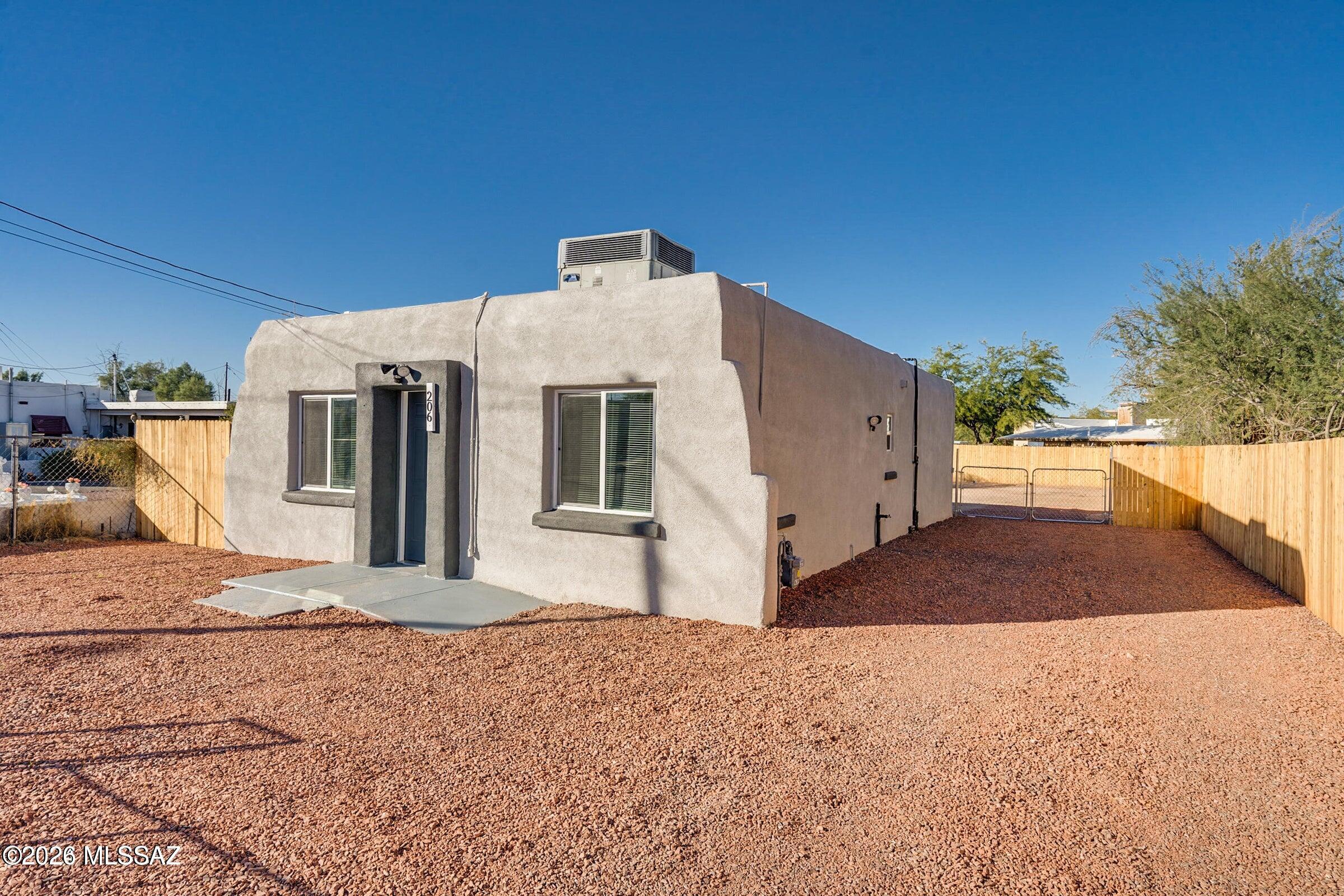 Sale is subject to lender approval. Short sale--submit the highest and best offer. Great opportunity to own this move-in-ready 3-bedroom, 1-bath home in Tucson. The property was remodeled in December 2024, prior to the current owner's purchase, and remains in great condition. The updated interior features ceramic tile flooring throughout, a bright kitchen with white cabinetry, stainless steel appliances, gas range and microwave, plus an updated bathroom with a tiled walk-in shower. Central air and forced-air heating provide year-round comfort. Outside, enjoy a low-maintenance front yard with decorative gravel, a fenced lot, and additional space for parking. Built in 1940 with Southwestern character, this home offers 1,081 sq. ft. on a 6,250 sq. ft. lot with no HOA. Conveniently located with easy access to I-10 and surrounding Tucson amenities. 
Photos are from a previous listing. Property is currently occupied.