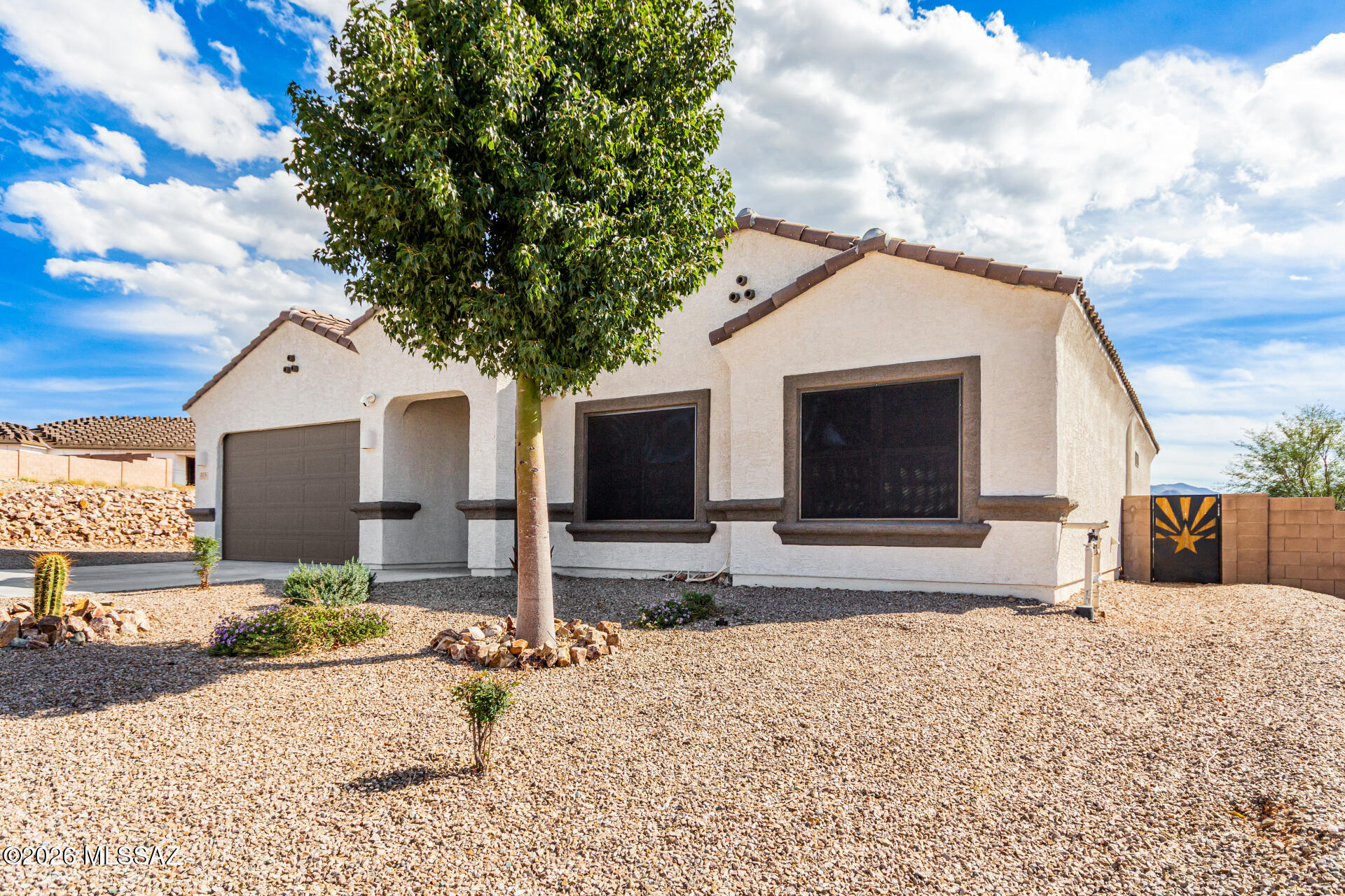 Stunning Modern Home in Vail, AZ with 2.875% Assumable VA Loan! Unlock an unprecedented financial opportunity! This immaculate, move-in-ready Vail residence offers the rare chance to bypass today's high market rates and assume the seller's existing 2.875% interest rate VA loan. Built in 2021 and located in the highly-coveted New Tucson community, this 4-bedroom, 2-bathroom contemporary masterpiece perfectly blends modern elegance, energy efficiency, and unobstructed desert views.
Spacious Living: 4 bedrooms, 2 bathrooms, and a versatile 2,101 sq. ft. open-concept floor plan designed for modern living. Chef-Inspired kitchen features an oversized central island, premium gas range stove, and a built-in reverse osmosis water filtration system--perfect for entertaining. A generous primary suite complete with a massive walk-in closet and spa-like privacy.
Stay comfortable and eco-friendly with a tankless water heater, whole-house water softener, water osmosis system and a spacious 2-car garage equipped with a 240V electric vehicle (EV) charging outlet. This premium lot offers lots of privacy situated on a quiet, family-friendly cul-de-sac with no neighbors directly behind, offering panoramic, unobstructed views of the breathtaking Santa Rita Mountains. This home is in the perfect location nestled in a peaceful, tight-knit neighborhood, this home offers access to top-tier education within the award-winning Vail School District. Enjoy the tranquility of suburban desert living while remaining just a short drive from Tucson's best dining, shopping, and outdoor recreation. Don't miss this rare combination of a rock-bottom interest rate, modern luxury, and mountain views. Schedule your private tour today before this opportunity is gone!