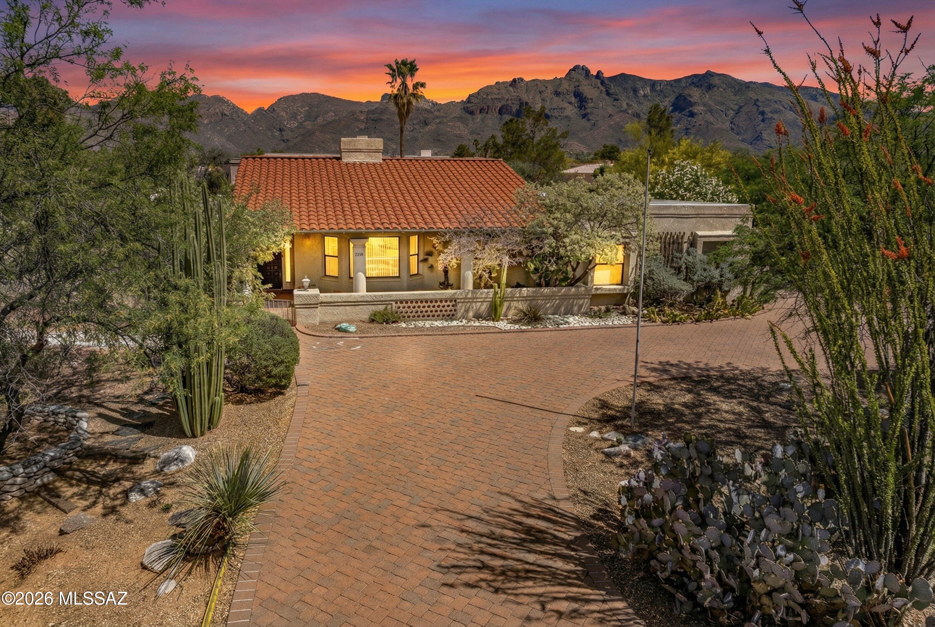 Nestled in the sought-after Shadow Hills. This beautifully positioned home offers the perfect blend of comfort, style, and Arizona living. Step inside to a light-filled interior with an open, inviting layout designed for both everyday living and effortless entertaining. The living spaces flow seamlessly, creating a warm and functional environment, while large windows bring in natural light and showcase the surrounding desert landscape. The kitchen serves as the heart of the home, offering ample space for gathering and connection. Bedrooms are thoughtfully laid out, providing privacy and comfort, while the primary suite offers a peaceful retreat. Outside, enjoy a serene setting with room to relax, entertain, or simply take in Tucson's stunning sunsets and mountain views. Whether you're .... .... hosting or unwinding, the outdoor space captures the essence of desert living.
Located in a desirable area close to shopping, dining, and outdoor recreation, this home combines convenience with a quiet, established neighborhood feel. A rare opportunity to own in one of Tucson's most coveted areas.