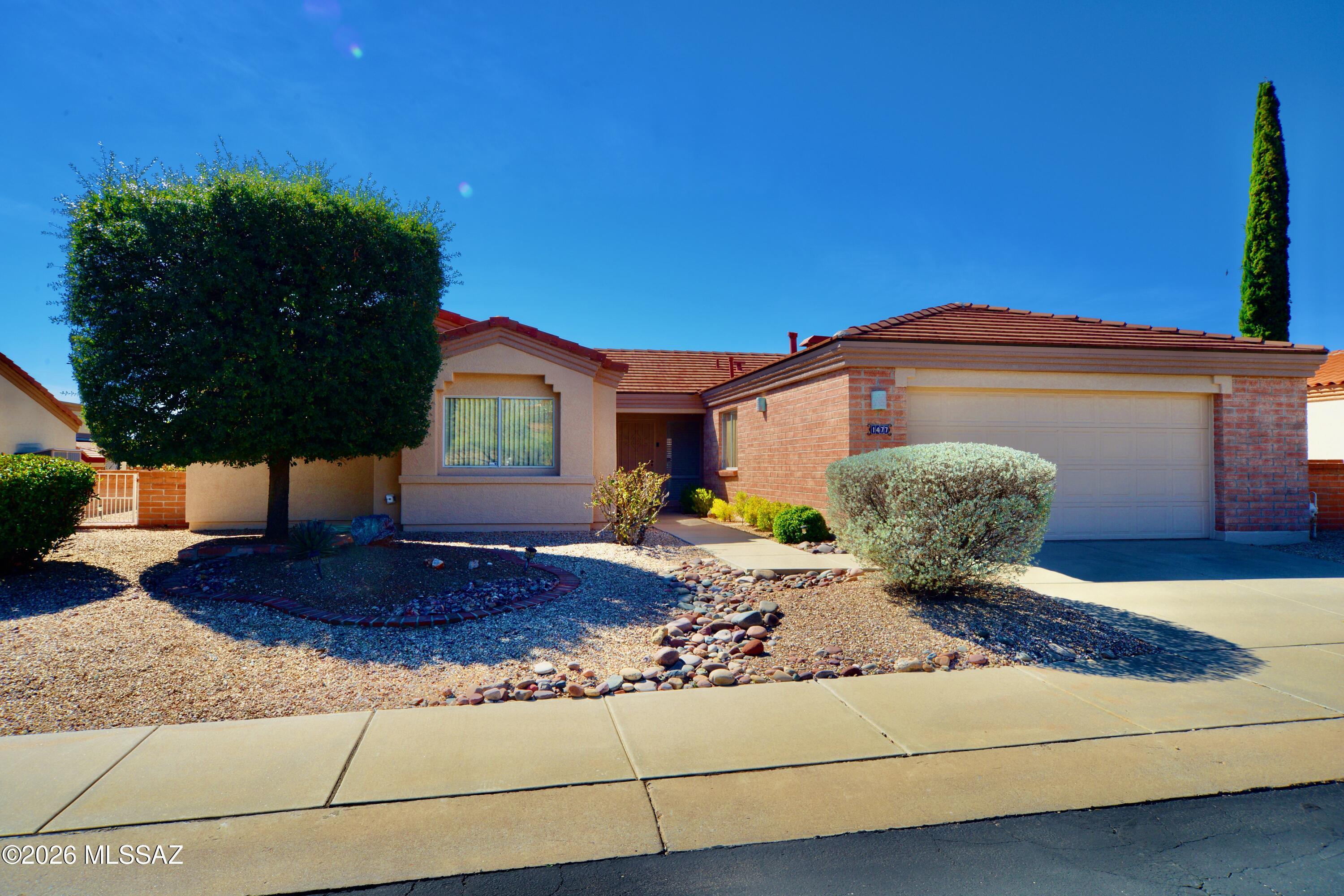 Welcome home to light and bright living with mountain views in an ideal, spacious floor plan. This inviting 55+ Green Valley home features two generous master suites plus a convenient powder room, perfect for guests or multi-generational living. Vaulted ceilings and abundant natural light create an open, airy feel throughout. Enjoy two separate living areas ideal for relaxing or entertaining, along with a spacious garage offering ample storage. Major updates include two HVAC units just 3-4 years old for year-round comfort. Prime location near Coyote Grill, GVR centers, golf, shopping, and dining.