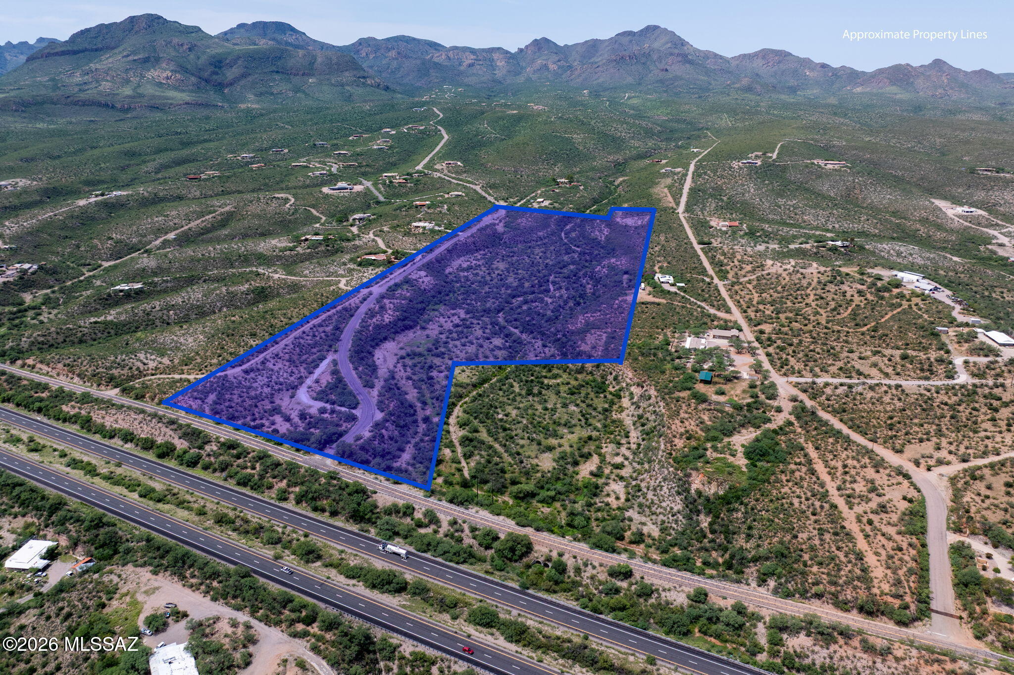 Well located 37 acre parcel with outstanding views and a well! This parcel of land consists of both residential and commercial zoning, has excellent access via a county maintained road as well as power and phone adjacent to the property. This is a great opportunity to build your dream home and have a home business on a portion of the property. This property is not in an HOA and consists of 3 parcel numbers.