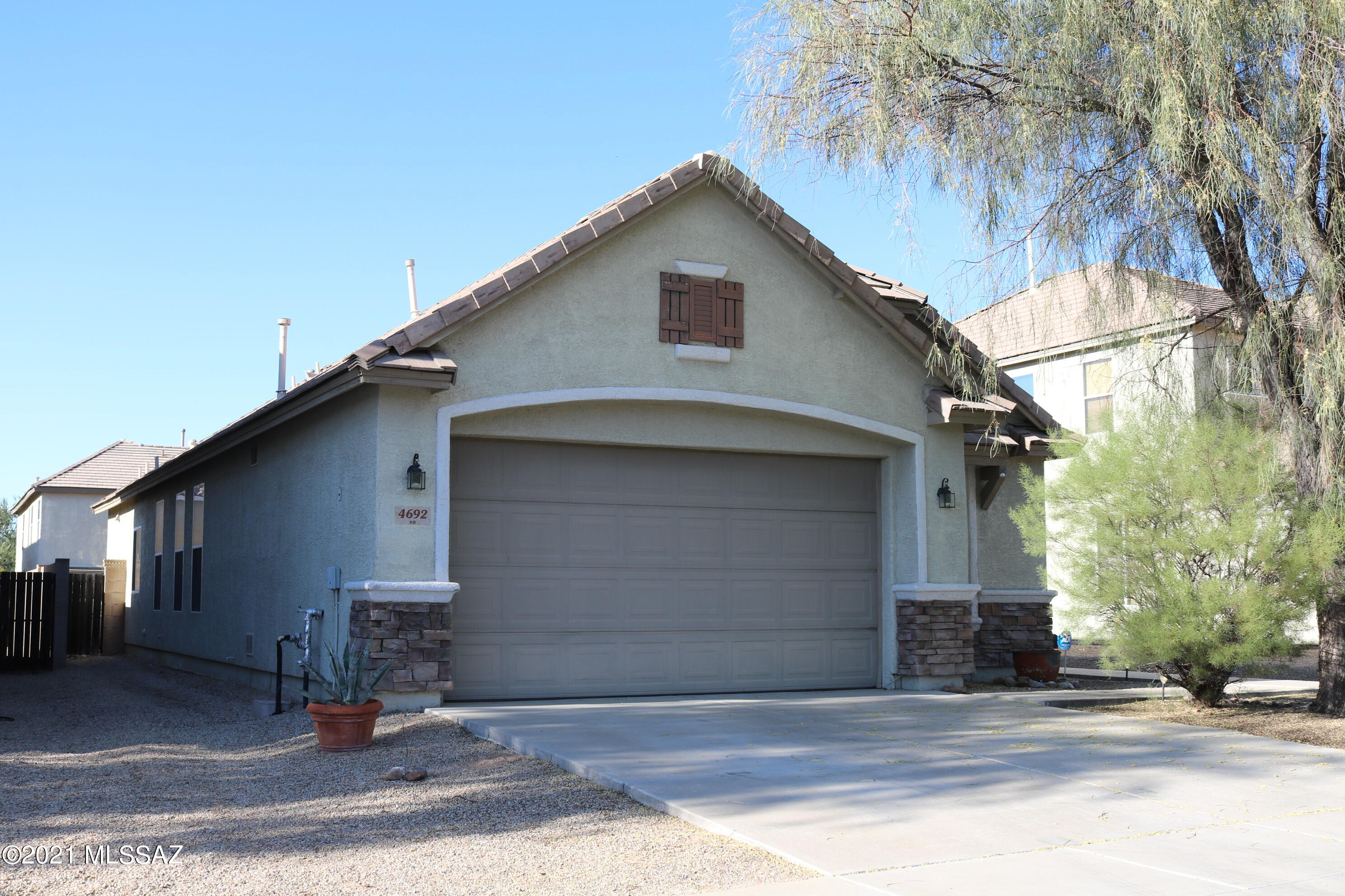Lovely 2 bedroom, 2 bath home with den.  Den could be used as a 3rd bedroom, TV room or home office.  Tile in the living areas, carpet in the bedrooms.  Nice size great room. Kitchen features Granite counter tops,  SS appliances and 42'' upper cabinets. Covered Patio and nicely landscaped backyard.  Small to medium size pet considered.
