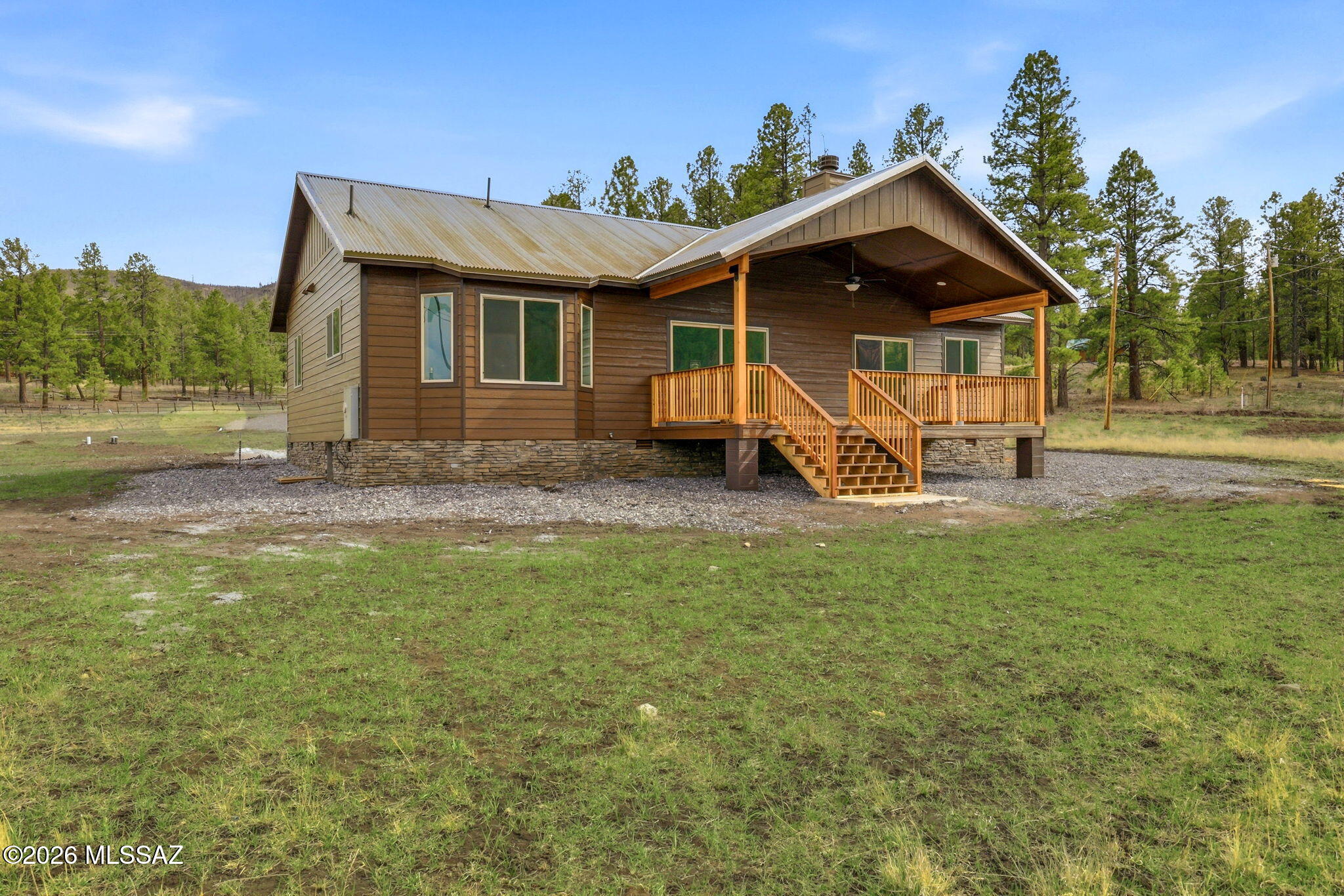 BEAUTIFUL NEW BUILD IN GREER! 3 BEDROOM & 2 BATH WITH DIRECT ACCESS TO NATIONAL FOREST AND THE LITTLE COLORADO RIVER. LEVEL .92 ACRE PARCEL WITH PLENTY OF ROOM FOR A GARAGE, BUILDING OR GUEST HOUSE. PANORAMIC WESTERN VIEWS FROM THE COVERED BACK PORCH. NO HOA & NO RESTRICTIONS. CITY SEWER & SHARED WELL. CHECKS ALL THE BOXES WITH A STACKED STONE FIREPLACE, GRANITE COUNTERS, VAULTED CEILING, AIR CONDITIONING, FRONT & REAR TREX DECKING, COR-TIN ROOF SYSTEM & MAINTENANCE FREE SIDING. PERFECT FOR YEAR AROUND LIVING, SEASONAL SNOWBIRD OR NIGHTLY RENTAL INVESTMENT, THIS CABIN WILL PROVIDE YEARS OF HASSLE-FREE ENJOYMENT. OWNER IS A LICENSED REAL ESTATE AGENT IN THE STATE OF ARIZONA.