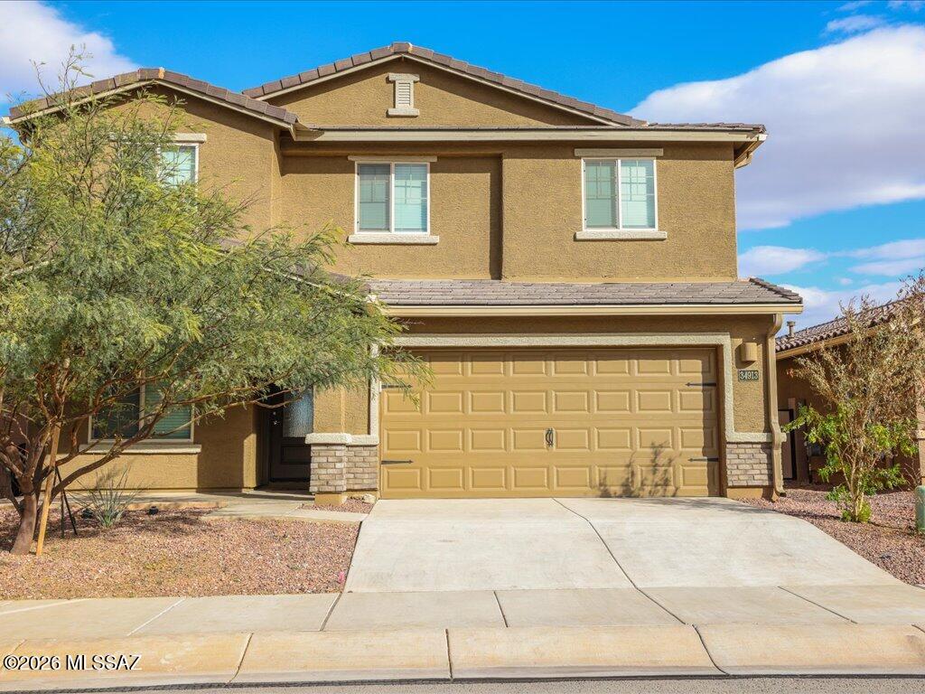 Welcome to this spacious and beautifully designed 5-bedroom, 3-bath home in the growing community of Red Rock Village! Built in 2023, this two-story residence offers thoughtfully designed living space featuring an open-concept floor plan, modern finishes, and abundant natural light throughout. The stylish kitchen boasts energy-efficient appliances, ample counter space, rich wood cabinetry, and a large island. Upstairs, enjoy generously sized bedrooms and a versatile loft area ideal for a home office, game room, or additional living space. The primary suite offers comfort and privacy with a spacious layout and ensuite bath. Additional highlights include central A/C, a 2-car garage, and a low-maintenance lot. Conveniently located near I-10 for easy commuting with a 2-car garage.