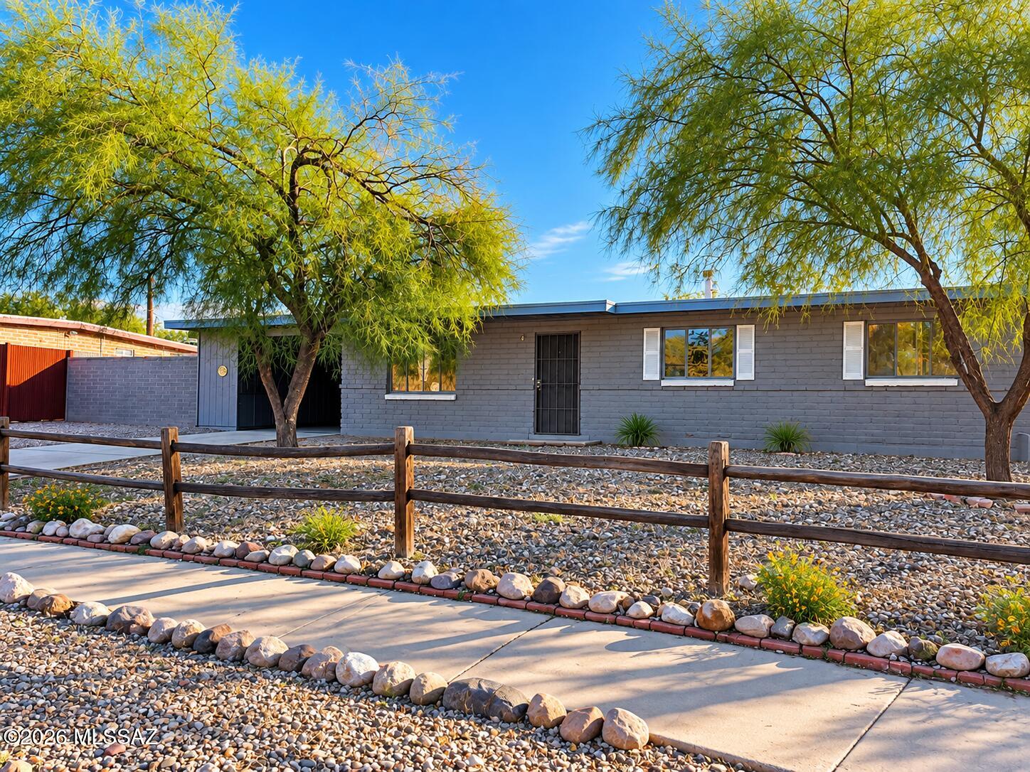 Discover the potential this Eastside home has to offer! Situated on an oversized lot with no HOA, this 3-bedroom, 2-bath home offers 1,395 sq. ft. of living space, ceramic tile throughout, and plenty of room to make it your own. The spacious lot provides room for RV parking, additional vehicles, or creating your ideal outdoor space. Recent updates include a new roof in 2023 and solar panels. This home is a great opportunity to add your personal touch and build equity. Conveniently located near Davis-Monthan AFB, Park Place Mall, grocery stores, restaurants, and parks. With generous outdoor space, covered parking, and endless possibilities, this home is ready for its next chapter. Come see the potential, bring your vision, and make this home your own!