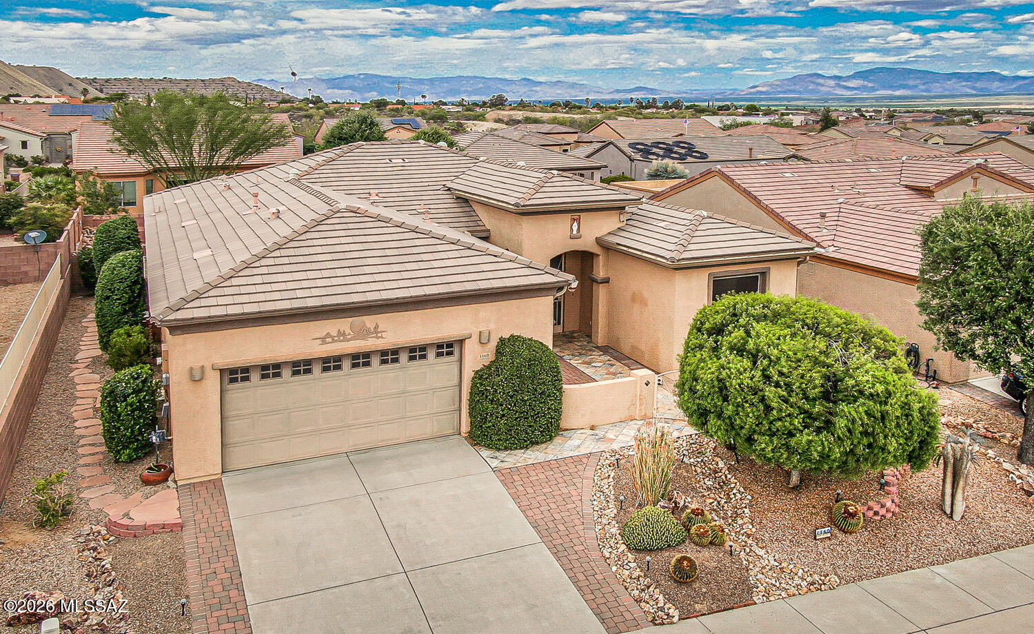 This Beautiful Las Campanas Home has it all: 2 Bedrooms, Den, Dining Room, Hobby Room and a 2 1/2 Car Garage. Upgrades throughout: Tile Floors, Granite Countertops, Tile Backsplash, Oak Cabinet, Ceiling Fan and many more great features. Large yard with a Grass lawn. A Huge 2 1/2 Car Garage. (There is a $200,000 VA assumable loan at 2.25%). Please take a look and you should be impressed.
