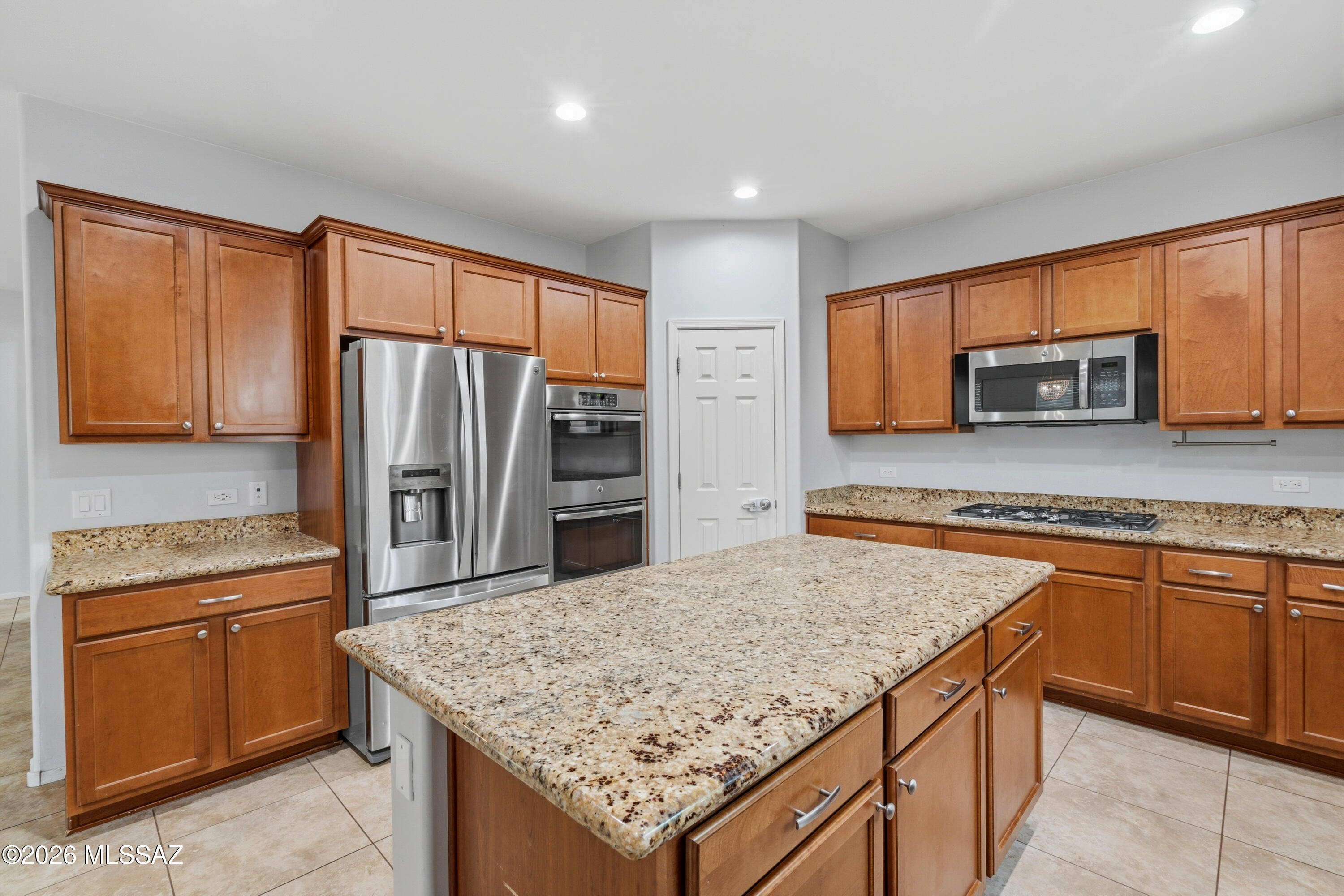 Not your average home! Built in 2014 and thoughtfully upgraded with features buyers often wish they had selected in a new build. This beautiful 4-bedroom, 2.5-bath home with a den offers space, comfort, and modern upgrades throughout. The gourmet kitchen features 42'' cabinetry, granite countertops, and a large center island perfect for cooking and entertaining. The open-concept in the main level is ideal for everyday living. The bright neutral tones is timesless with 24'' ceramic tile, and newer laminate flooring create a warm, inviting atmosphere. Upstairs, a versatile loft with projector is perfect for movie nights or a media room. Come see for yourself why this could be the perfect place to call home!