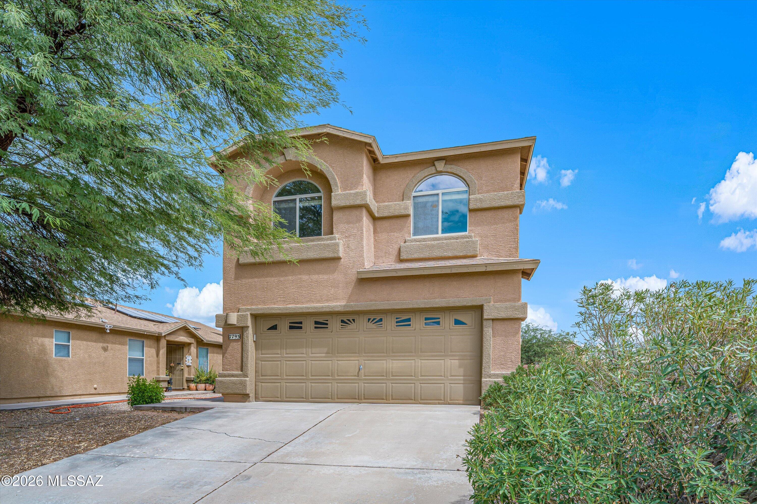 Seller will accept or counter offers between $300,000 and $315,000. Award-winning schools, Tucson price point! This 3BR/3BA home sits in the Vail School District, without the premium price of a Vail-proper address. This 1,904 SF two-story offers a smart layout: formal living/dining room upon entry, and a family room off the kitchen, 3 bedrooms plus a loft upstairs, 2 full baths upstairs and a powder room downstairs for guests and convenience. Backyard features mature trees, a covered patio, and no rear neighbors. Community park included.