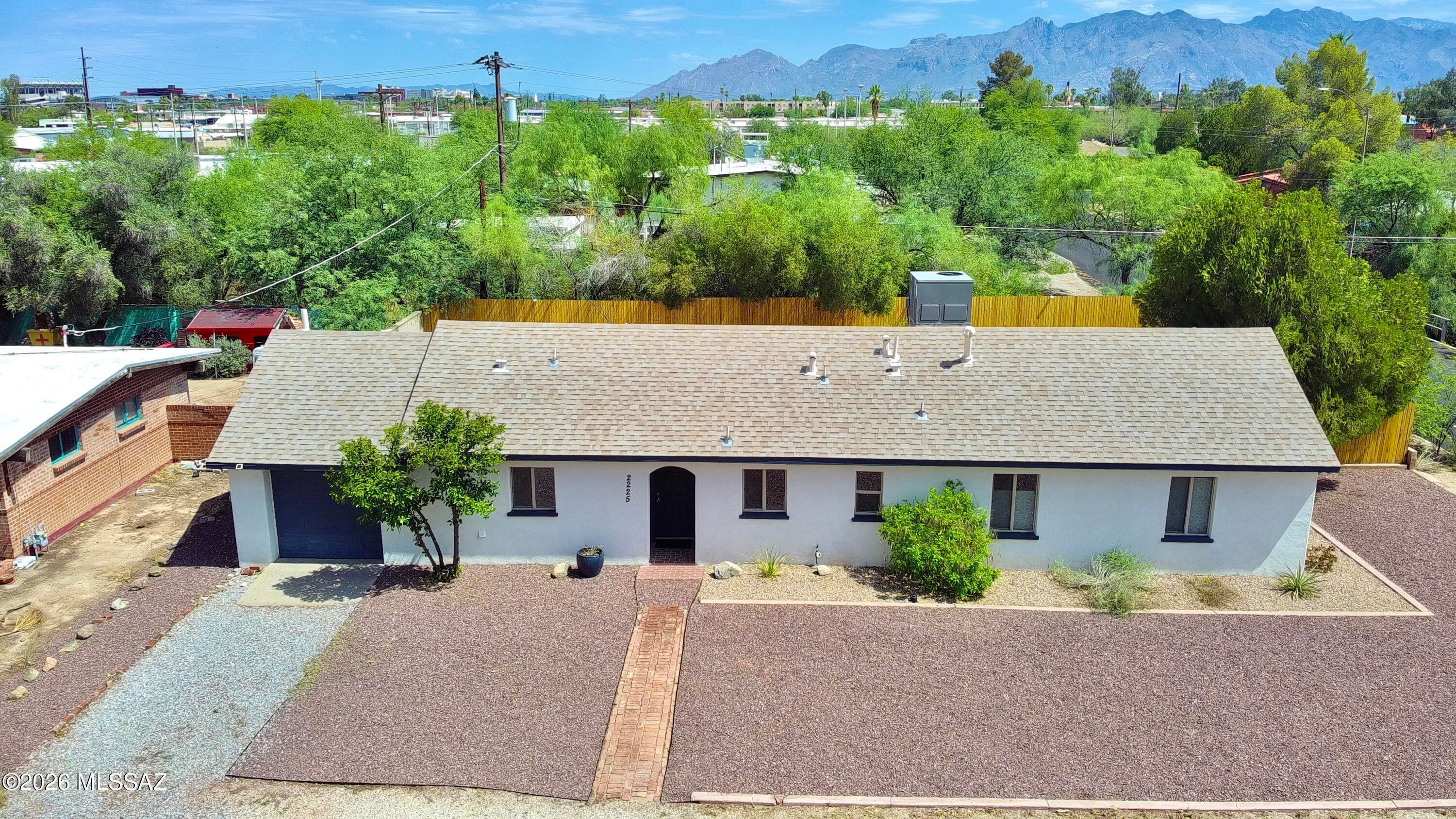 Welcome to 2225 E. 15th Street, where comfort, convenience, and opportunity come together in one of Tucson's most desirable central locations. This move-in-ready 3-bedroom, 2-bath home features recent renovations and fresh paint, creating a bright and inviting atmosphere from the moment you step inside.
Enjoy the added indoor/outdoor living space of the enclosed Arizona room, perfect for relaxing, entertaining or a hobby room. An enclosed laundry room provides extra functionality with less heat, while the attached one-car garage offers convenient parking and storage.
Situated on a spacious lot with room for a future ADU or expanded outdoor living (buyer to verify), this property offers incredible flexibility and long-term value. Just a half mile from Trader Joe's and minutes from popular restaurants, shopping, the University of Arizona, downtown, and Reid Park, you'll love the unbeatable central location.
Whether you're looking for a primary residence, investment property, or a home with room to grow, this one checks all the boxes! Let's not forget the extra off street parking available too!