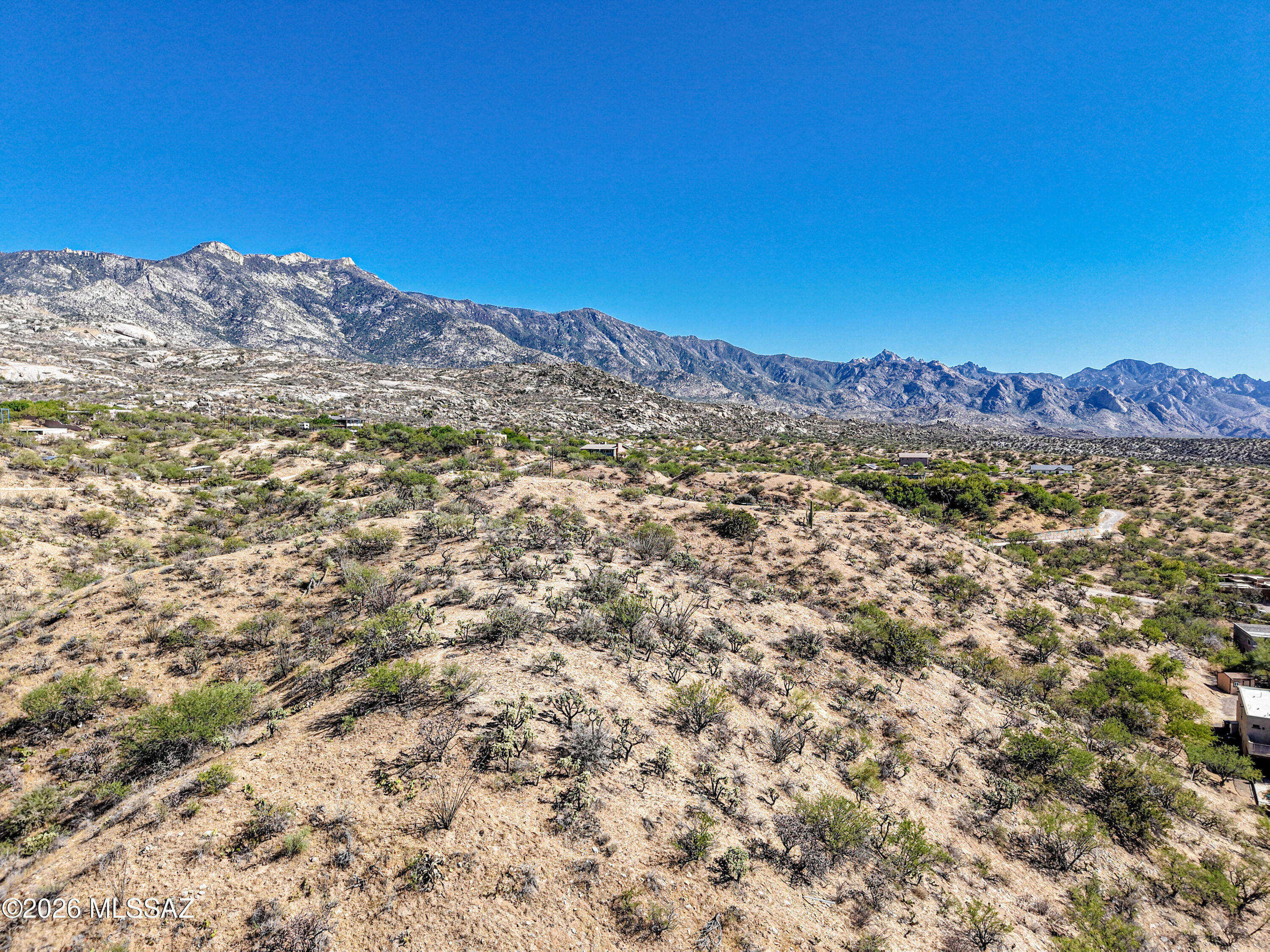 A truly REMARKABLE hilltop lot with commanding, 360 degree, elevated views of the Catalina Mountains and the valley below! This 1.01 acre property needs to be seen to be fully appreciated. There's tremendous potential to craft a remarkable residence that delivers both privacy and jaw-dropping views. Just about every room in your new home could have gorgeous vistas! Site work for the building pad has proven to be quite easy and affordable at neighboring properties too. The adjacent lot is available for sale too, providing an option for over 2 acres of buildable area and delivering additional privacy. Electric, water and phone are nearby. Close to hiking & biking trails, the National Forest, and so much more! A short drive to grocery stores & restaurants. Call today for a site tour!