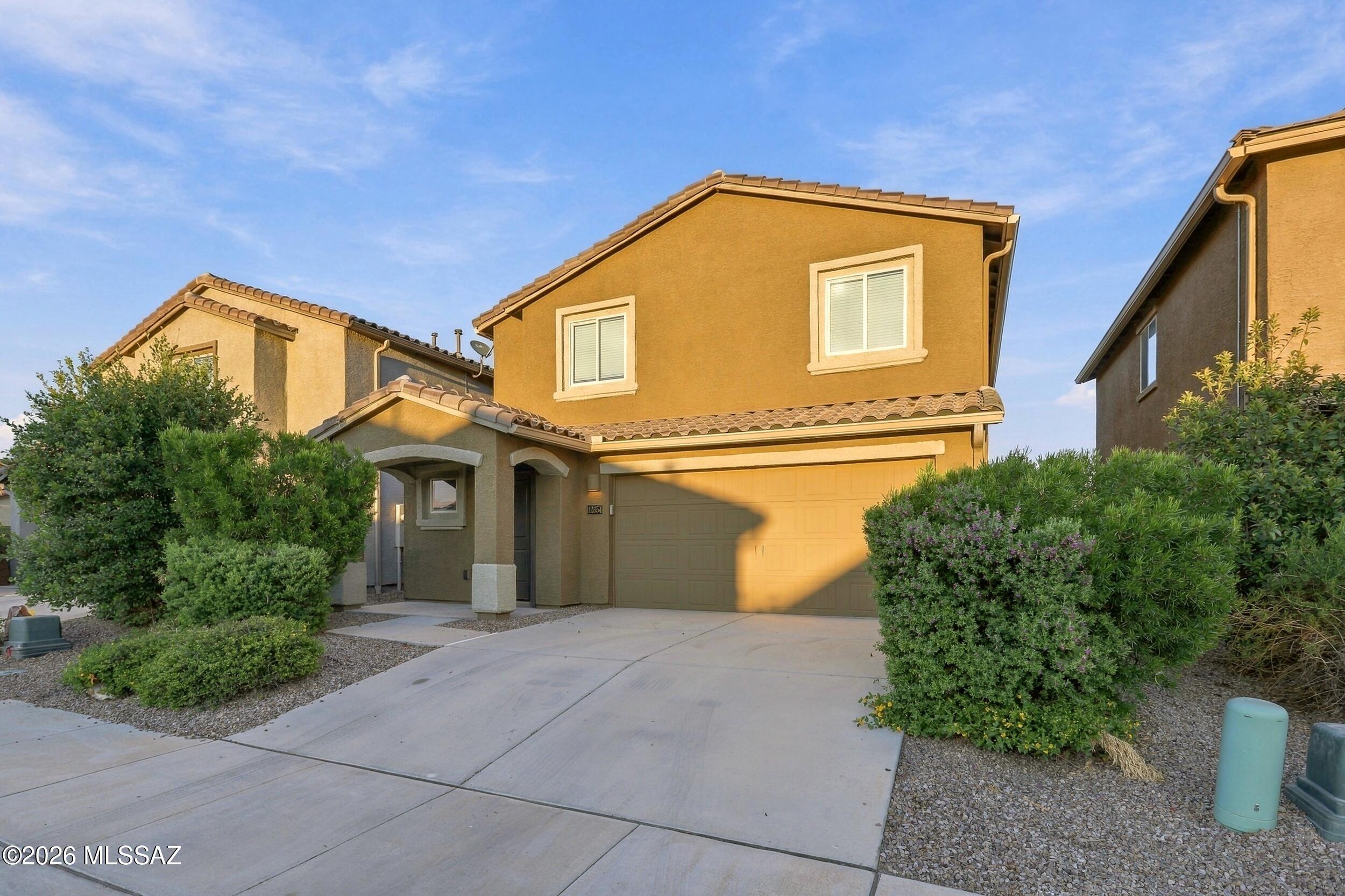 Nestled in Fianchetto Farms is a beautiful 5 Bedroom+Loft , 3 Bathroom, 2,330 sq.ft. home with a brand new interior paint and exterior paint done in 2026. This Move-In Ready home comes with Washer/Dryer upstairs and French Door Refrigerator. Granite Countertops throughout Kitchen and Bathrooms and stainless steel appliances.  With the property built in 2023, all you need to do is move right on in with tremendous value. Look no further with the primary bedroom looking out towards Dove Mountain greeting you with sunrises and the views that Arizona has to offer. All within the Marana School district and all the benefits of Galdden Farms. Even the backyard has been turfed and paved ready. So much home with tremendous value. Schedule a showing today!