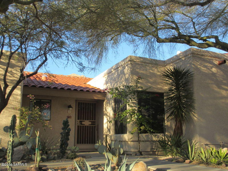Gated Rancho Sin Vacas Villas are nestled in the Catalinas in N Tucson. This exclusive community of private homes and villas with 24/7 guard security. This private townhome has stunning backyard views with desert fauna. This 2 bedroom 1 bath home boasts a kiva fireplace, soaring ceilings and a wonderfully peaceful atmosphere. The community has a heated pool/spa and beautiful clubhouse and rec center. Water, sewer, trash included in rent. Call for your showing now. Pets NEGOTIABLE.