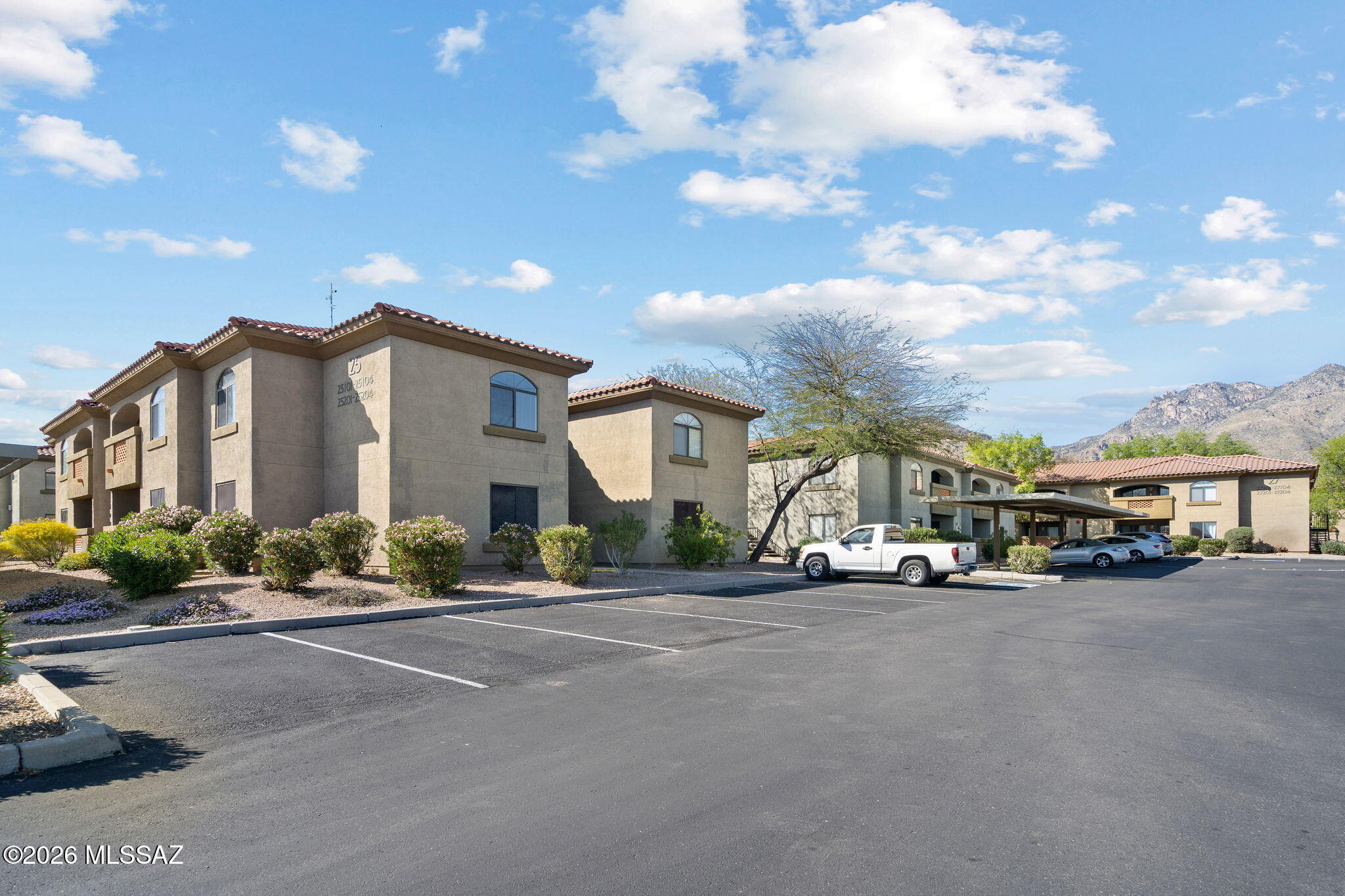 Motivated Seller! Embrace the ultimate foothills lifestyle in this  upstairs corner condo in Building 25 at Veranda at Ventana. This residence features brand-new flooring, fresh paint, updated outlets, and stunning mountain views from the kitchen and third bedroom. Enjoy instant access to the secondary community pool and spa just steps from your door. This exclusive 24-hour gated community offers two resort style pools, a fitness center, BBQ grills, and a clubhouse. Unbeatable location close to premium shopping, dining, and scenic hiking trails!