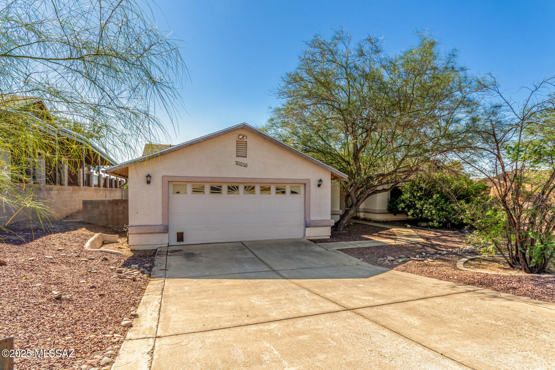 Seller will accept/counter offers between 339,900 - 389,900. Spacious 4-bed home on a 0.67-acre lot with RV parking and no HOA. An open layout showcases vaulted ceilings, recessed lighting, and durable wood-look flooring. The light-filled kitchen features skylights, custom cabinetry, mosaic tile backsplash, stainless appliances, pantry, and a peninsula with seating. Double doors open to a versatile den ideal for office, etc. The primary suite offers backyard access, a jetted tub, and a walk-in closet. Outside, enjoy a covered patio, built-in BBQ, and expansive yard with room to design your outdoor setup garden, toys, or future additions (buyer to verify).