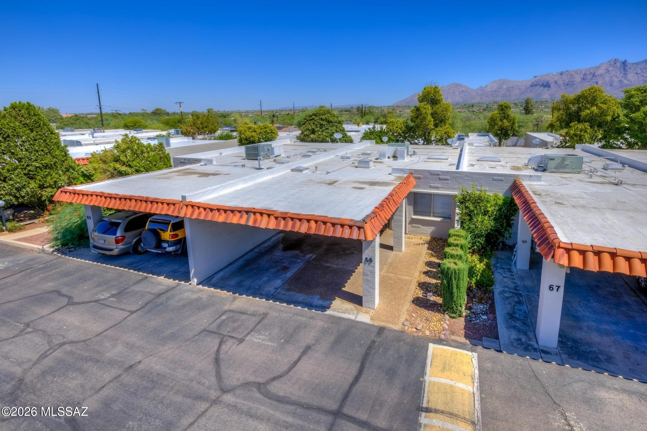 Turnkey investment opportunity with immediate cash flow! This income-producing townhome is currently leased through June 2027 at $1,750 per month, making it an excellent addition to any investment portfolio. Located in the desirable Tucson-Prince Townhomes community, this well-maintained home features an open and inviting floor plan filled with natural light from multiple skylights. The spacious living area showcases a charming beehive wood-burning fireplace, while the kitchen offers an electric range, oven, refrigerator, dishwasher, pantry, and garbage disposal. The washer and dryer are also included for added convenience. Additional features include vinyl flooring, dual-pane windows, ceiling fans, extra storage, an attached car port, and a private screened patio with mountain views. Residents enjoy community amenities including a swimming pool, spa, recreation room, tennis court, and beautifully maintained common areas. Centrally located near the University of Arizona, Banner University Medical Center, shopping, dining, and major employers, this property continues to be in a highly desirable rental location. Whether you're a seasoned investor or purchasing your first income property, this is a rare opportunity to acquire a professionally leased, income-producing home with established rental income already in place.
