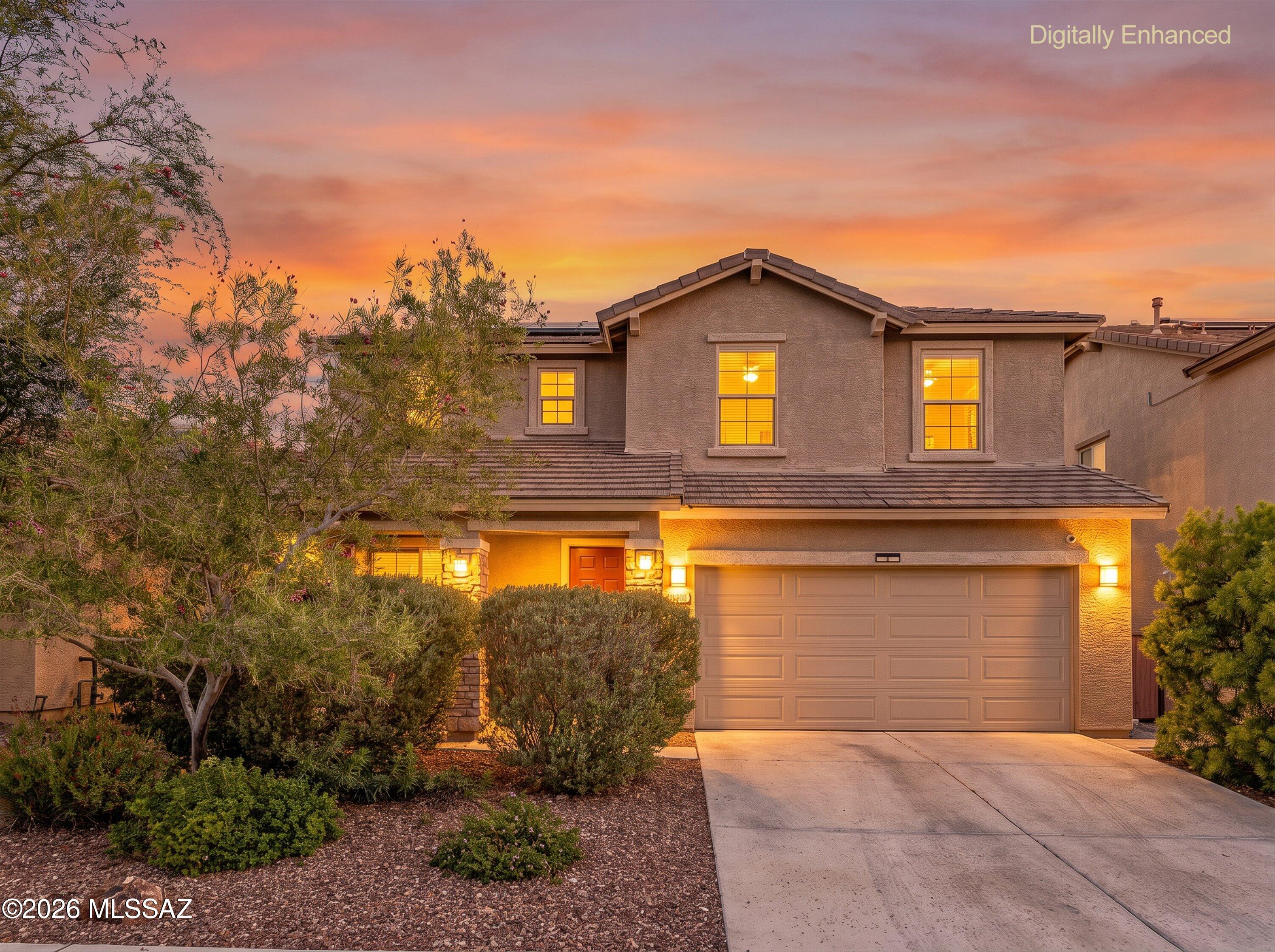 Stunning 4 bedroom 2.5 bath Vail home with 3 vast living spaces, open dining, incredible views and so much more!! The main floor has a large living room and family room, dining area, chef's kitchen and two pantries. The beautiful kitchen boasts plenty of cabinet and counter space, plus a gorgeous eat-in island. Upstairs is a spacious loft, along with the laundry room, primary suite and 3 generous guest rooms. The backyard is lovely and low maintenance with a covered patio, pavers, and artificial turf- and no homes built behind it for unblemished views. Additional features include OWNED SOLAR, ceiling fans, newer appliances, multiple walk in closets and a 3 car garage. Must See!!!!